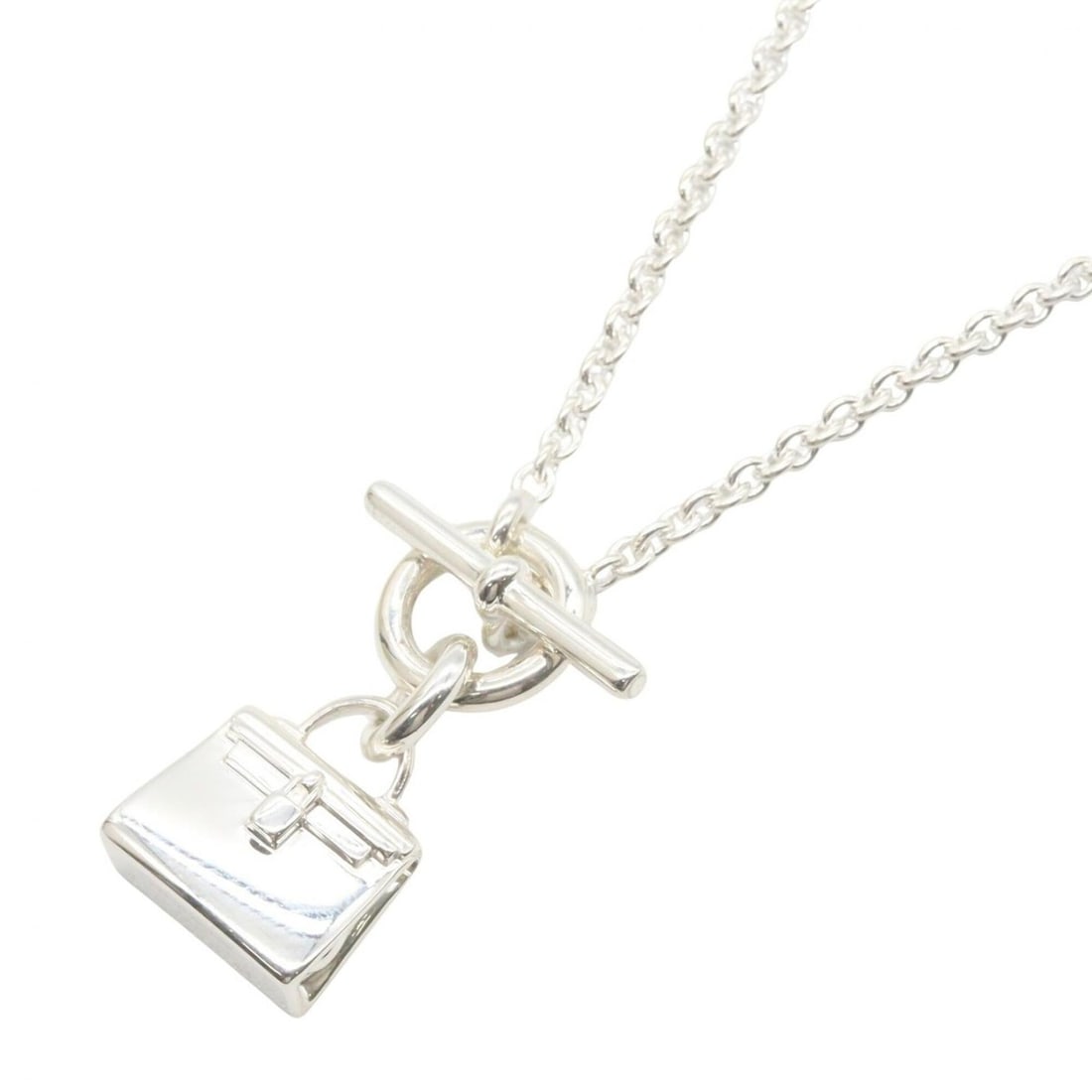 Hermes Amulette Kelly Necklace, Sterling Silver 925, Women's Jewelry, Tone: --- Catalog ---Category: SizePendant Size: 12mm x 25mm / 0.47'' x 0.98''Neck Circumference: 40.5 cm / 15.94''Category: DesignColor: SilverGender: WomenMaterial: Silver 925Necklace Type: NecklaceCatego