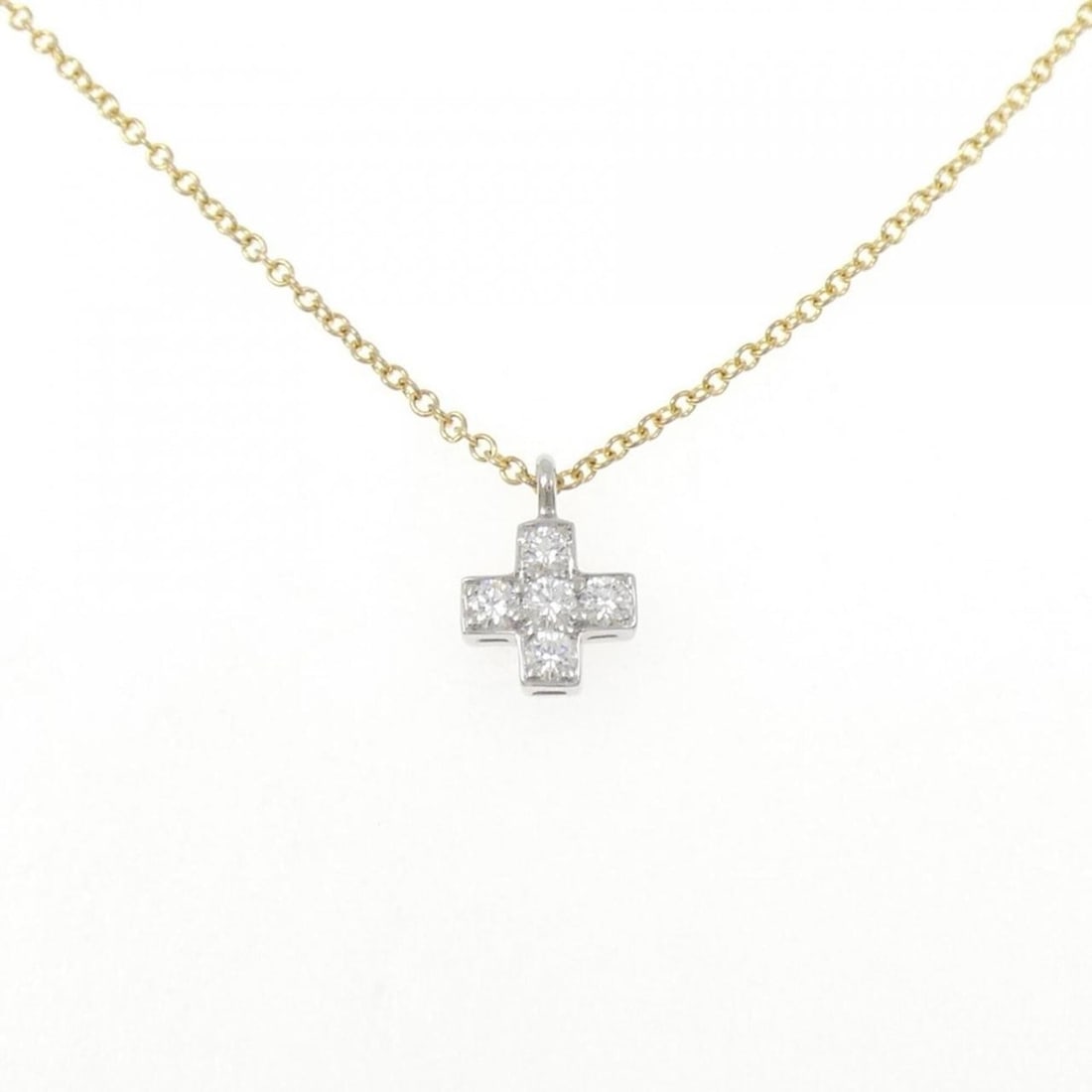 Tiffany Cruciform Necklace: --- Catalog ---Category: SizePendant Size: 9.6mm x 6.7mm / 0.37'' x 0.26''Neck Circumference: 41 cm / 16.14''Category: DesignGender: WomenMaterial: Platinum 950, Yellow gold (18K)Pendant Type: Pendant
