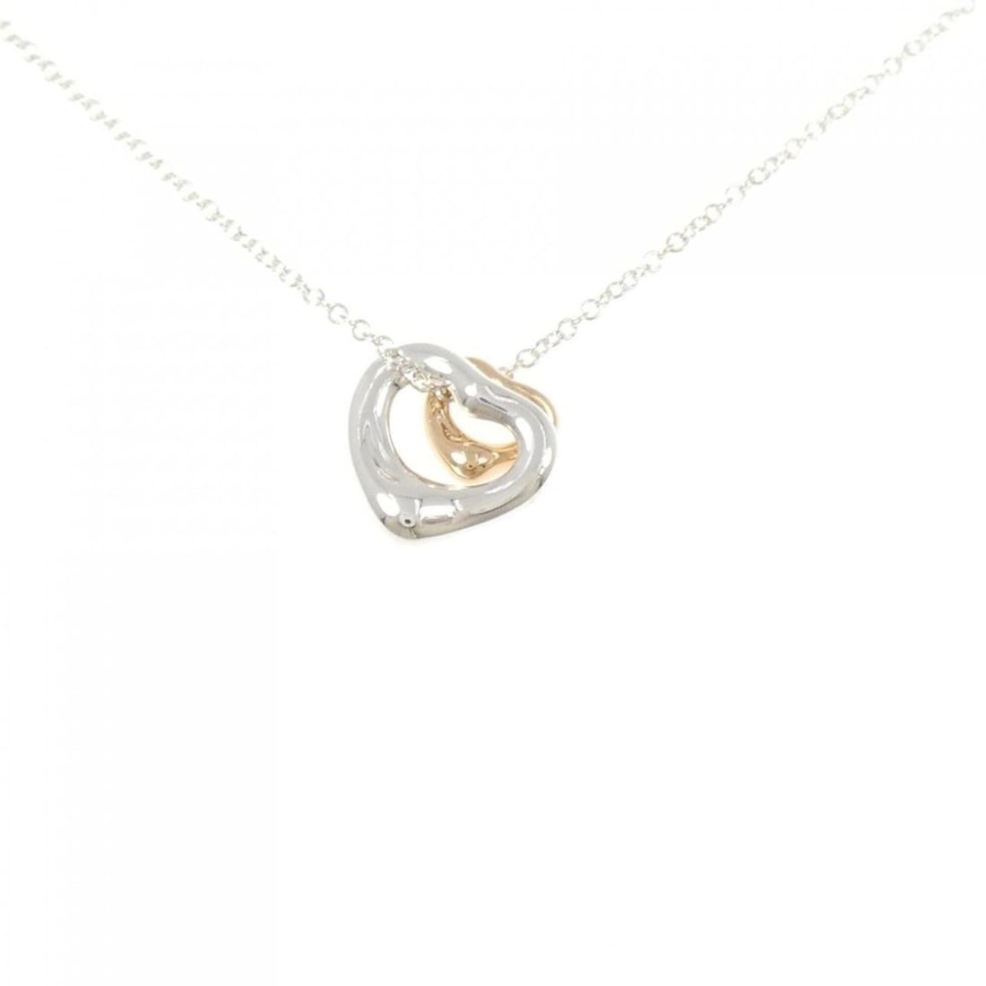 Tiffany Open Heart Extra Mini Necklace: --- Catalog ---Category: SizePendant Size: 11.3mm x 10mm / 0.44'' x 0.39''Neck Circumference: 41 cm / 16.14''Category: DesignGender: WomenMaterial: Pink gold (18K), Silver 925Pendant Type: