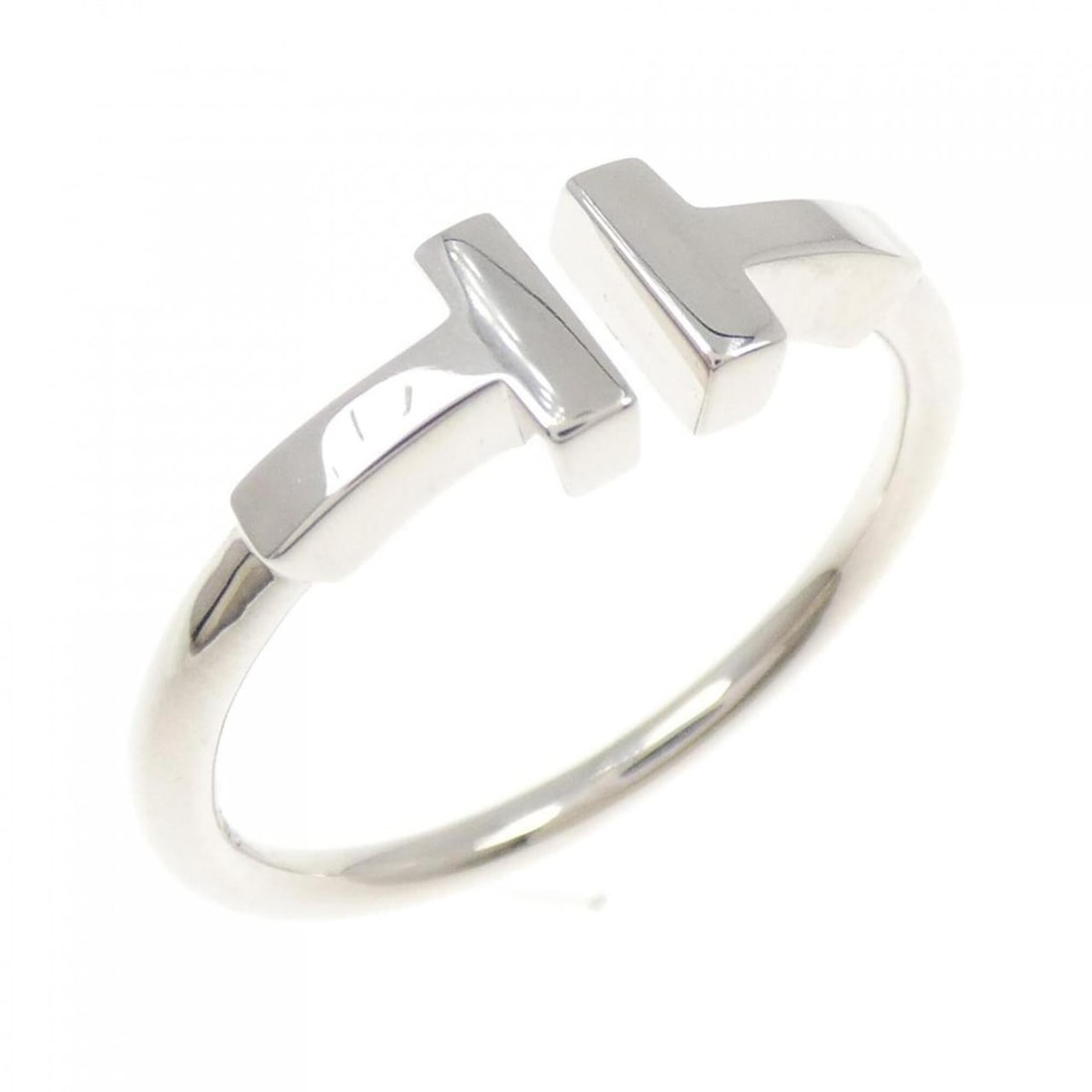 Tiffany T Wire Ring: --- Catalog ---Category: SizeJP Size: 13US Size: 6.5Category: DesignType: Band ringGender: WomenMaterial: White gold (18K)Category: GeneralBrand: Tiffany--- Item List ---Section: ConditionRanking: