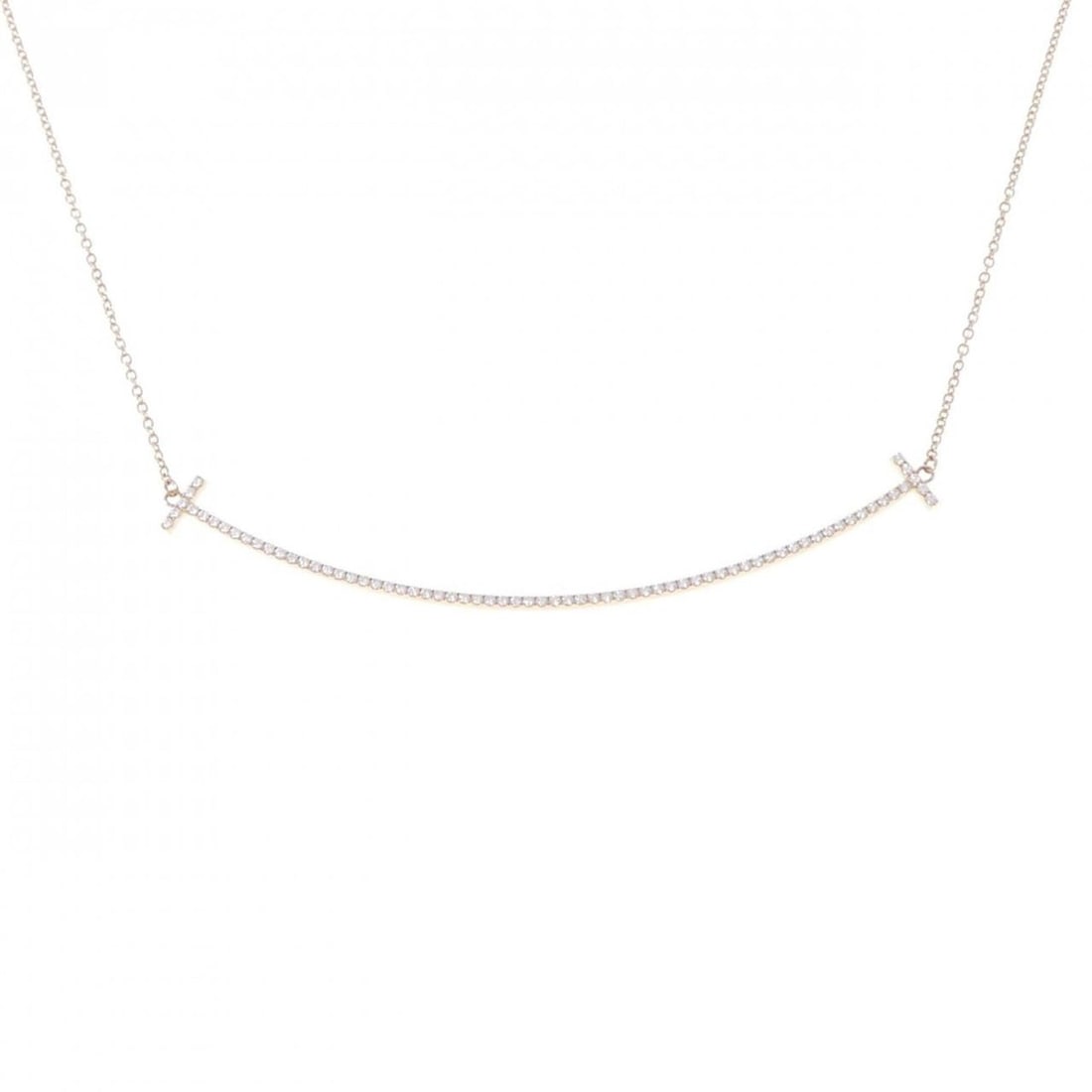 Tiffany & Co. T Smile Large Necklace: --- Catalog ---Category: SizePendant Size: 6mm x 68.9mm / 0.23'' x 2.71''Neck Circumference: 41 cm - 45 cm / 16.14'' - 17.71''Category: DesignGender: WomenMaterial: Pink gold (18K)Pendant Type: Pendan