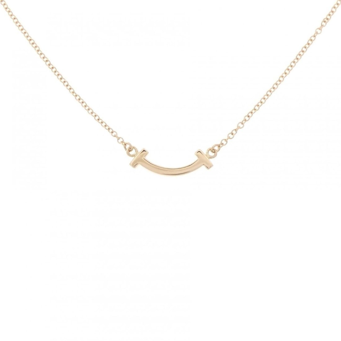 Tiffany T Smile Mini Necklace: --- Catalog ---Category: SizePendant Size: 3.5mm x 13.1mm / 0.13'' x 0.51''Neck Circumference: 41 cm - 46 cm / 16.14'' - 18.11''Category: DesignGender: WomenMaterial: Pink gold (18K)Pendant Type: