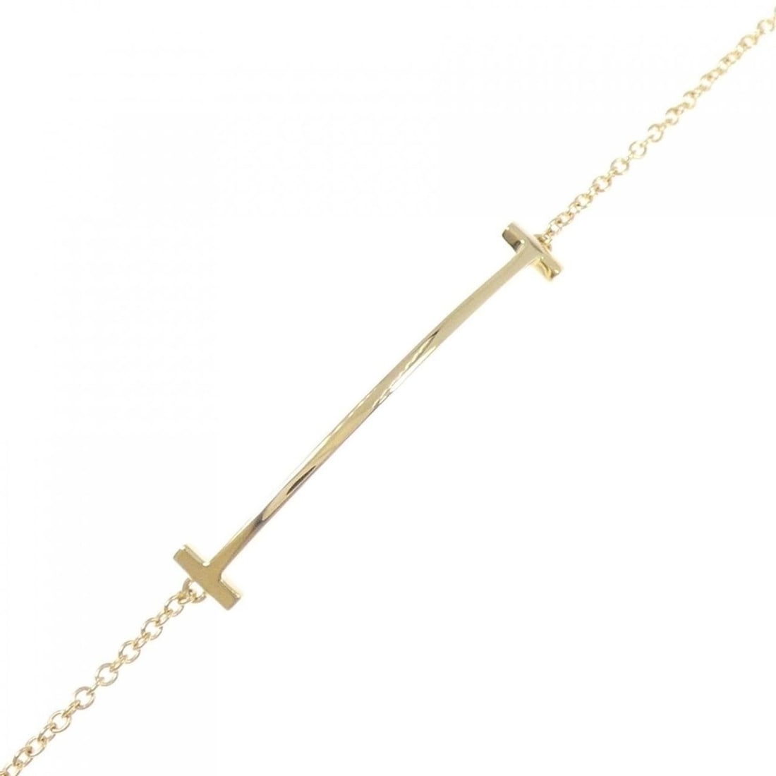 Tiffany T Smile Bracelet: --- Catalog ---Category: SizeLength: 15.5cm / 6.1''Category: DesignType: Charm braceletGender: WomenMaterial: Yellow gold (18K)Category: GeneralBrand: Tiffany--- Item List ---Section: