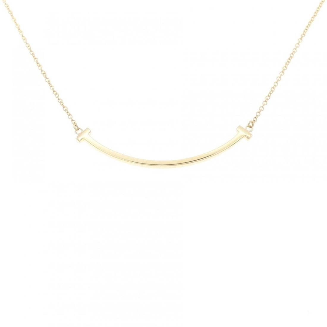 Tiffany T Smile Small Necklace: --- Catalog ---Category: SizePendant Size: 3.5mm x 37mm / 0.13'' x 1.45''Neck Circumference: 40 cm - 45 cm / 15.74'' - 17.71''Category: DesignGender: WomenMaterial: Yellow gold (18K)Pendant Type: