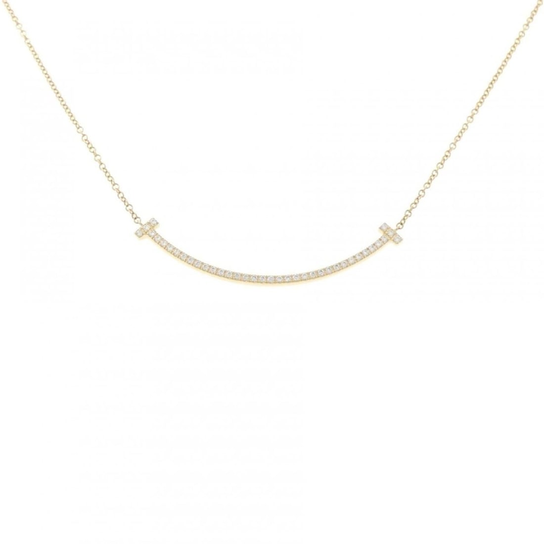 Tiffany T Smile Small Necklace: --- Catalog ---Category: SizePendant Size: 3.7mm x 36.8mm / 0.14'' x 1.44''Neck Circumference: 40 cm / 15.74''Category: DesignGender: WomenMaterial: Yellow gold (18K)Pendant Type: PendantNecklace Type