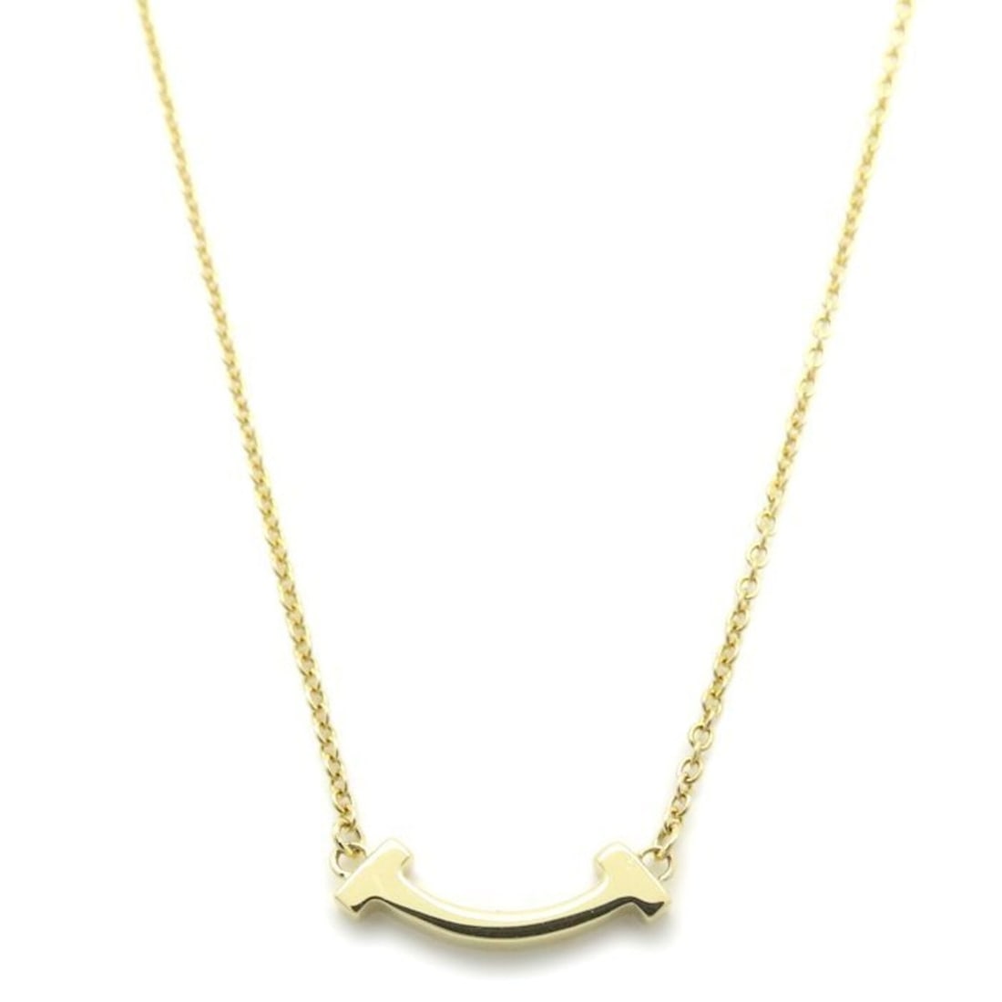 TIFFANY&Co. Tiffany T Smile Mini Necklace 18K Yellow Gold Women's 295867: --- Catalog ---Category: SizePendant Size: 3.6mm x 13.4mm / 0.14'' x 0.52''Neck Circumference: 40.5 cm - 45.5 cm / 15.94'' - 17.91''Category: DesignColor: Yellow goldGender: WomenMaterial: Yellow