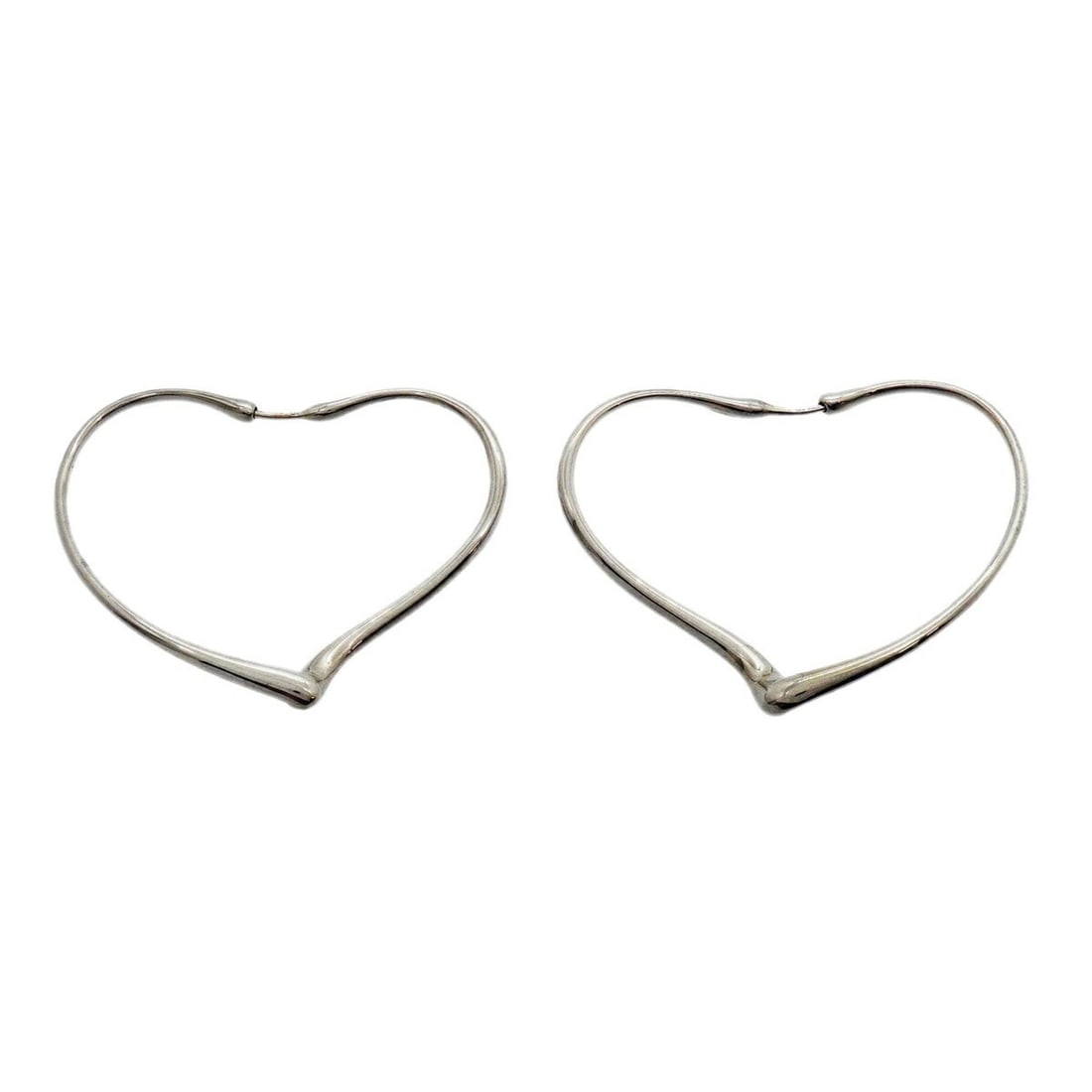 Tiffany & Co. Heart Sterling Silver 925 Earrings for Women: --- Catalog ---Category: SizeSize (HxWxD): 39.90mm x 5.40mm / 1.57'' x 0.21''Category: DesignType: Stud earringsGender: WomenMaterial: Silver 925Category: GeneralBrand: Tiffany--- Item List ---Section