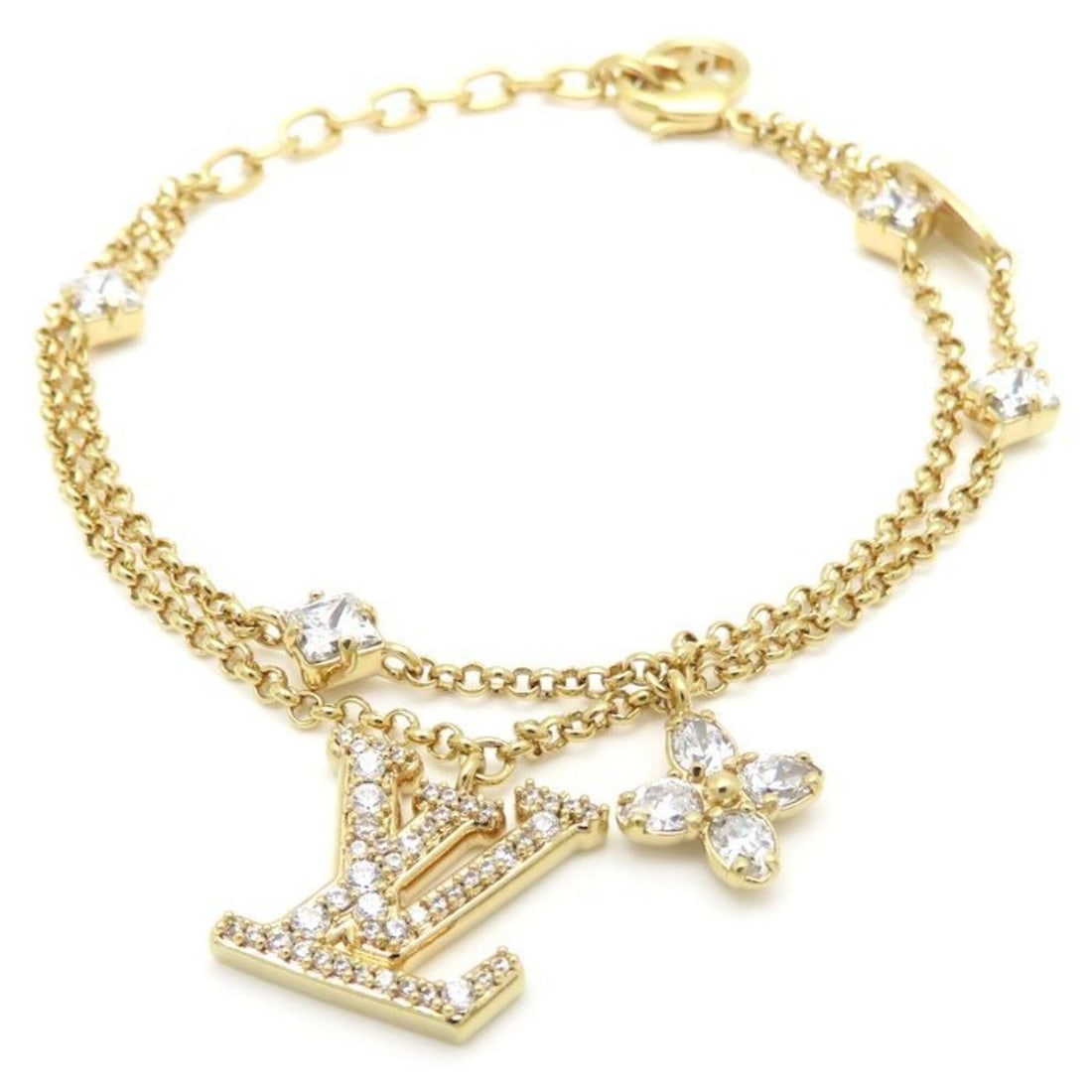 LOUIS VUITTON Strass Bracelet Lady LV Women's M1582A 295879: --- Catalog ---Category: SizeLength: 19.5cm / 7.67''Category: DesignType: Charm braceletColor: GoldGender: WomenMaterial: Gold plating, RhinestoneCategory: GeneralMPN: M1582ABrand: Louis Vuitton---