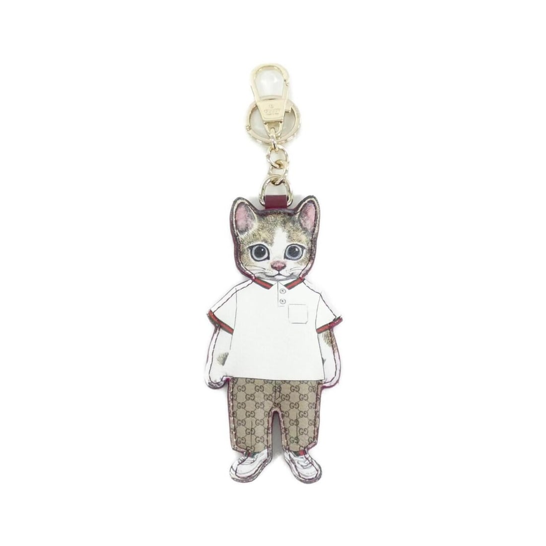 Gucci 844247 JAAJU Keyring: --- Catalog ---Category: SizeSize (HxWxD): 13cm x 6cm / 5.11'' x 2.36''Category: DesignType: KeyringColor: Beige, Dark brownGender: Men,WomenCategory: GeneralBrand: Gucci--- Item List ---Section: