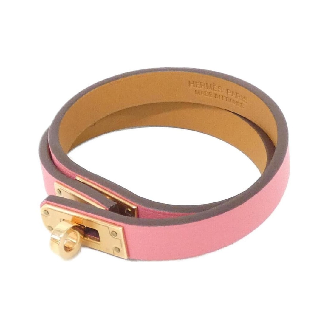 Hermes Mini Kelly Double Tour 081182CD Bracelet: --- Catalog ---Category: SizeLength: 35cm / 13.77''Category: DesignType: Charm braceletColor: Rose azaleeGender: WomenMaterial: Swift leatherCategory: GeneralBrand: Hermes--- Item List ---Section: