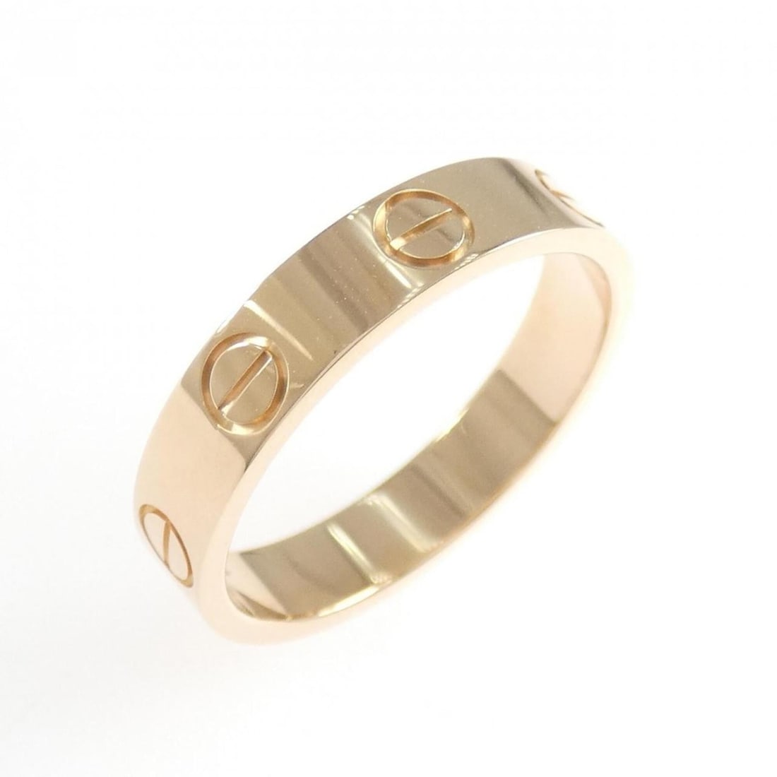 Cartier Mini Love Ring: --- Catalog ---Category: SizeJP Size: 9US Size: 5Category: DesignType: Band ringGender: WomenMaterial: Pink gold (18K)Category: GeneralLine: LoveBrand: Cartier--- Item List ---Section: