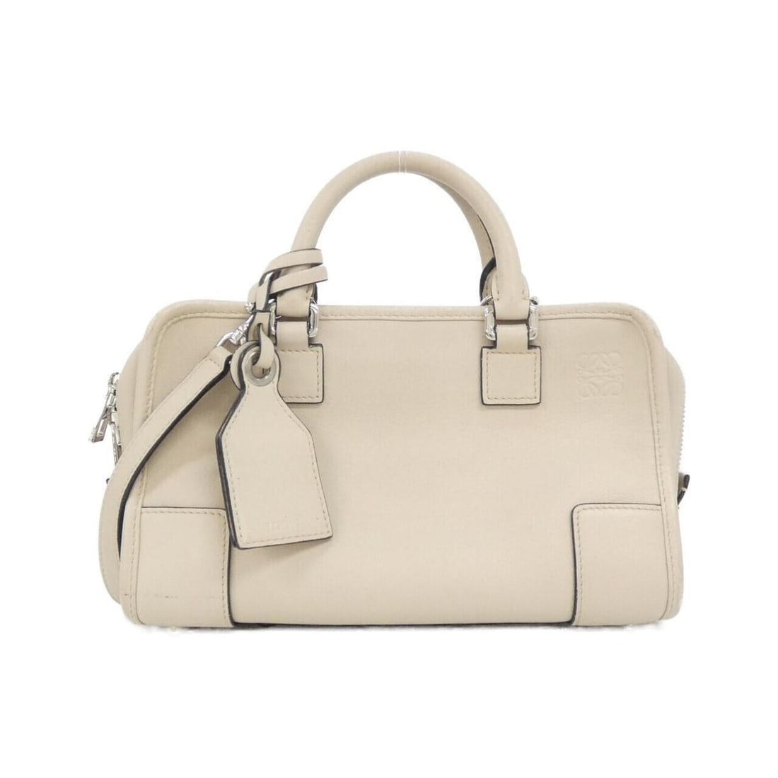 Loewe Amazona 23cm 352 30 N71 Handbag: --- Catalog ---Category: SizeSize (HxWxD): 14cm x 23.5cm x 10cm / 5.51'' x 9.25'' x 3.93''Category: DesignType: HandbagColor: Light beigeGender: Women,MenMaterial: Leather Hardware Color: SilverLeathe