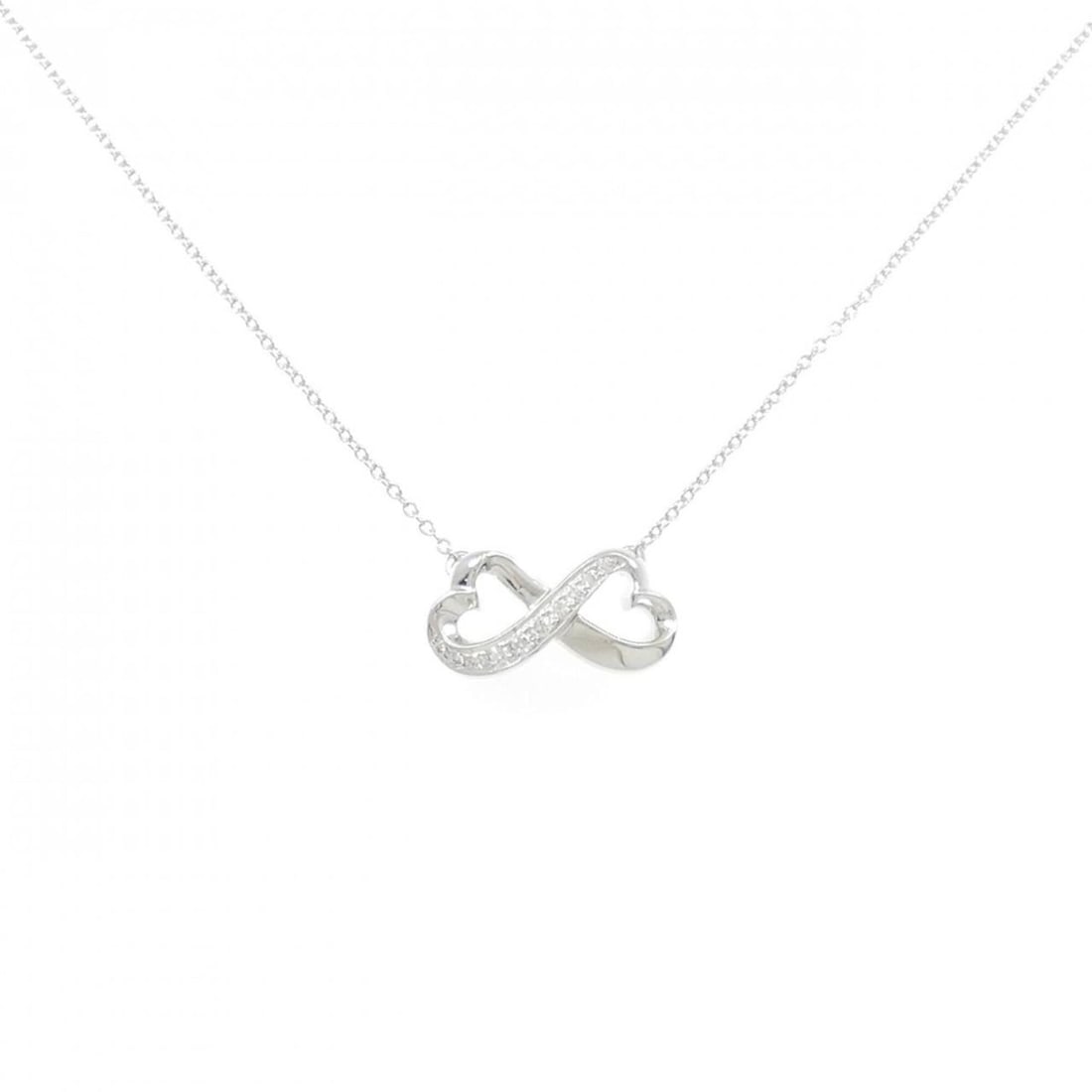 Tiffany Double Loving Heart Necklace: --- Catalog ---Category: SizePendant Size: 9mm x 17.5mm / 0.35'' x 0.68''Neck Circumference: 42 cm / 16.53''Category: DesignColor: White goldStone: DiamondGender: WomenMaterial: White gold