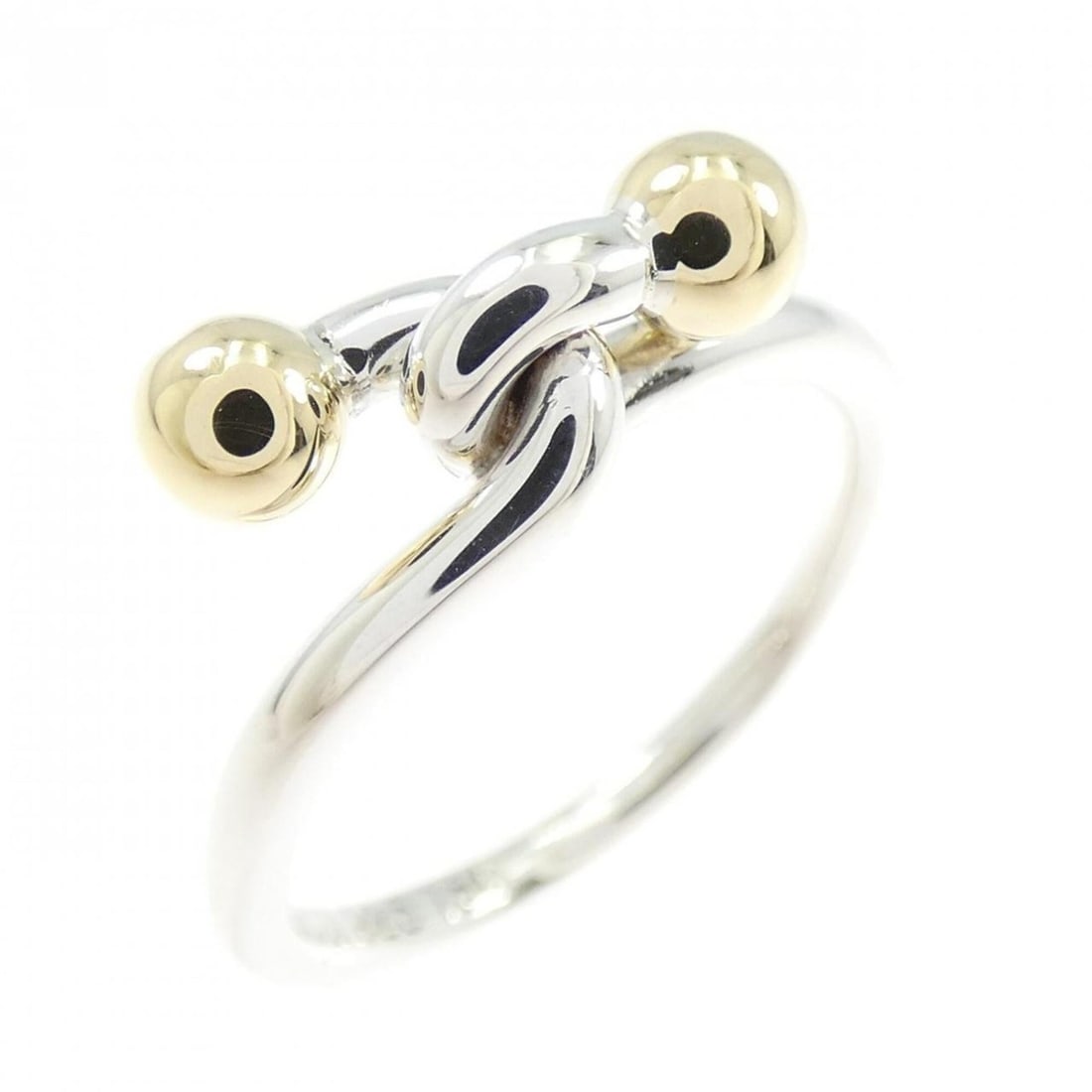 Tiffany hook ring: --- Catalog ---Category: SizeJP Size: 10US Size: 5.5Category: DesignType: Band ringColor: Silver, Yellow goldGender: WomenMaterial: Silver 925, Yellow gold (18K)Category: GeneralBrand: Tiffany---