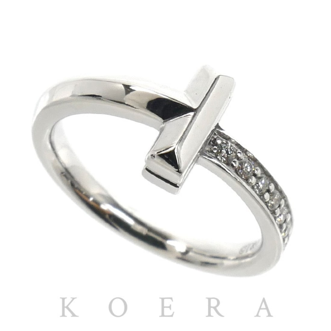 TIFFANY&Co. Tiffany & Co. 18KWG White Gold T One Diamond Ring (67795474) - 3.9g Women's: --- Catalog ---Category: SizeUS Size: 4Brand Size: 47Category: DesignType: Band ringStone: DiamondGender: WomenMaterial: White gold (18K)Category: GeneralMPN: 67795474Brand: TiffanyCountry of Origin: 