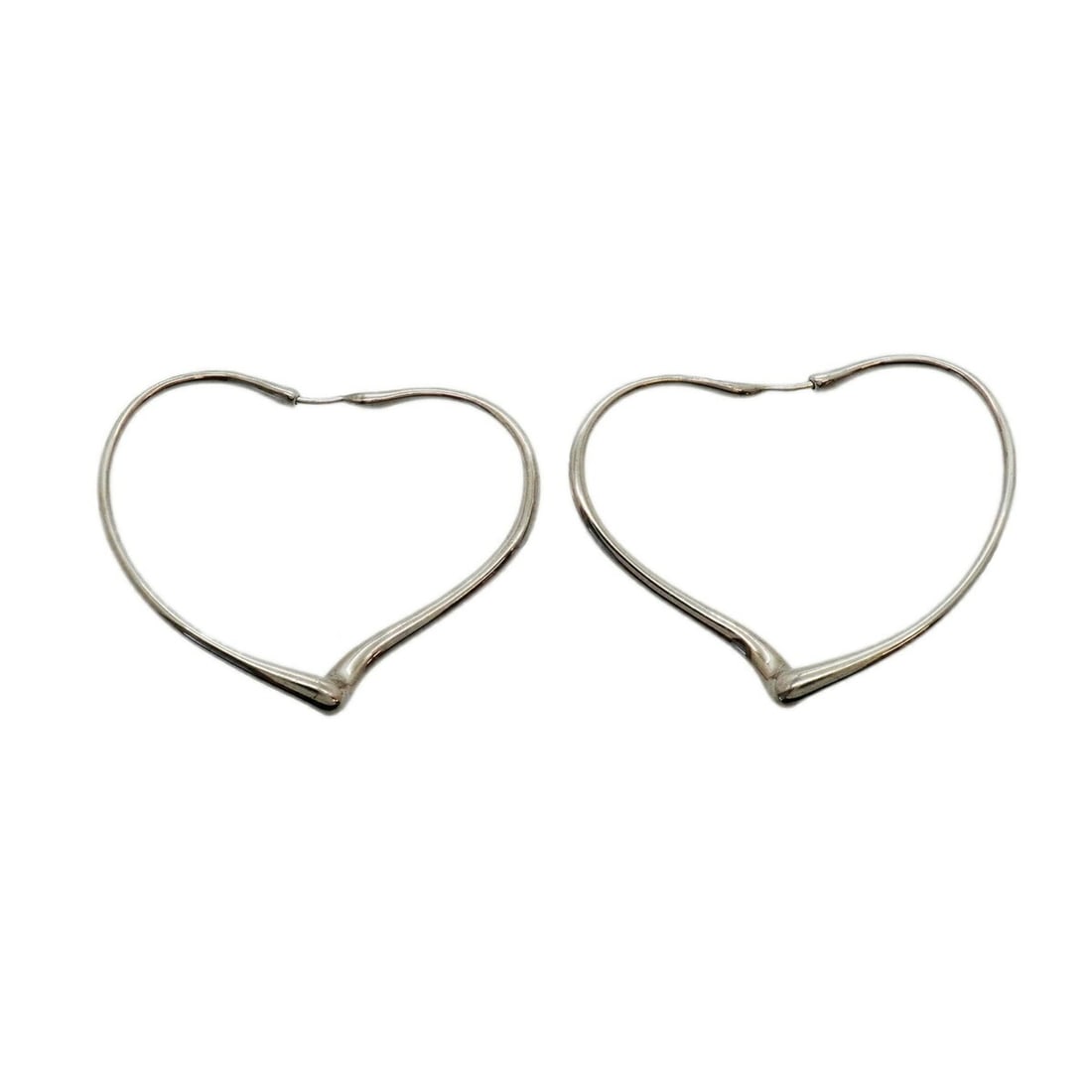 Tiffany & Co. Heart Sterling Silver 925 Earrings for Women: --- Catalog ---Category: SizeSize (HxWxD): 39.70mm x 6.00mm / 1.56'' x 0.24''Category: DesignType: Stud earringsGender: WomenMaterial: Silver 925Category: GeneralBrand: Tiffany--- Item List ---Section