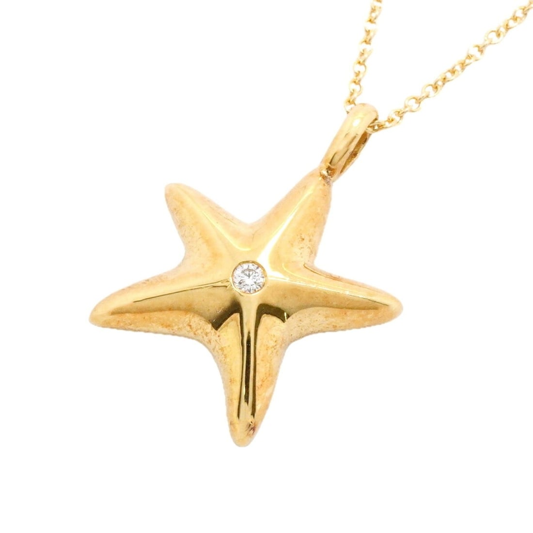 Tiffany & Co. Starfish Necklace, 1PD (18K Yellow Gold) Diamond, Ladies' Necklace: --- Catalog ---Category: SizePendant Size: 20.7mm x 15.3mm / 0.81'' x 0.6''Neck Circumference: 40.5 cm / 15.94''Category: DesignStone: DiamondGender: WomenMaterial: Yellow gold (18K)Necklace Type: Nec