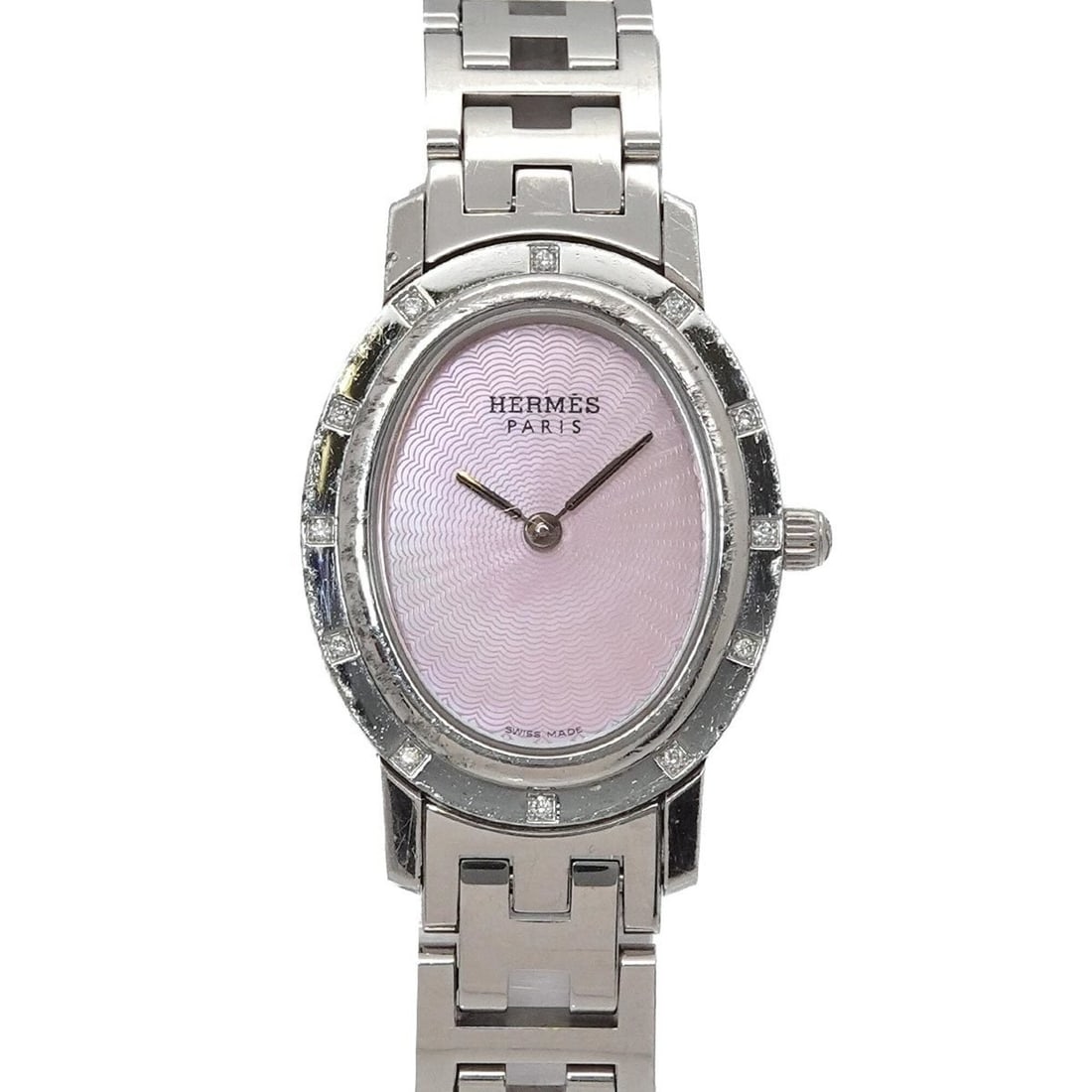 Hermes Clipper Nacre Oval CO1 230 Women's Watch, Diamond Bezel, Pink Shell, Quartz Watch: --- Catalog ---Category: SizeWrist Size: 14.5cm / 5.7''Case Diameter: 22mm / 0.87''Category: DesignType: WristwatchGender: WomenColor (Dial): Pink shellMaterial (Band): Stainless steelMaterial (Case):