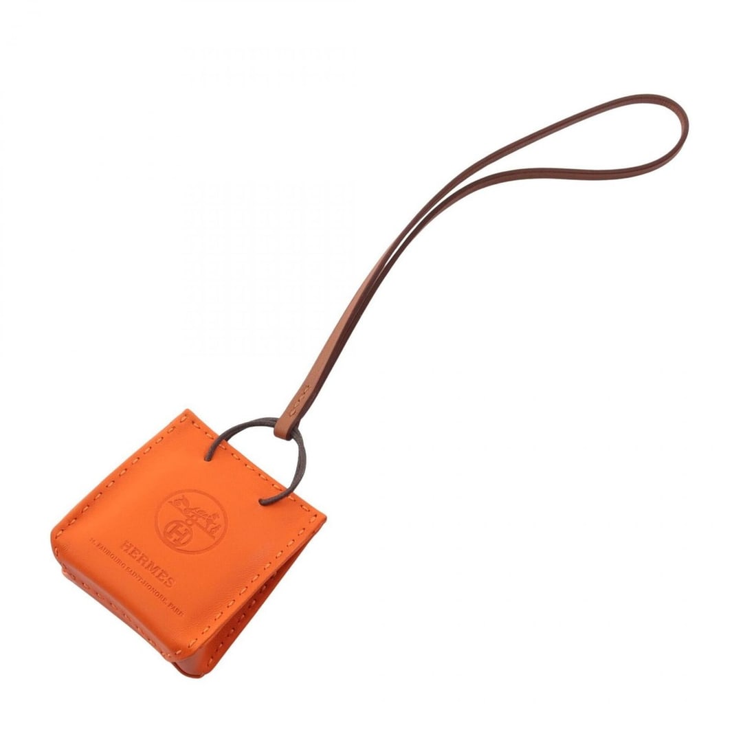 Hermes Sac Orange Feu Gold Charm Accessory, Agneau Milo Leather, Women's, Orange/Brown Tones: --- Catalog ---Category: DesignType: Handbag charmColor: Brown, OrangeGender: WomenMaterial: Agneau MiloCategory: GeneralBrand: Hermes--- Item List ---Section: ConditionRanking: Rank A Used - A few tr