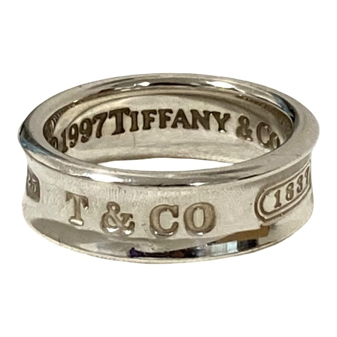 Tiffany & Co. 1837 Ring, 925 Sterling Silver, Size 1 (approx.), Women's.: --- Catalog ---Category: SizeJP Size: 15US Size: 7.5Category: DesignType: Band ringGender: WomenMaterial: Silver 925Category: GeneralBrand: Tiffany--- Item List ---Section: ConditionRanking: Rank SA U