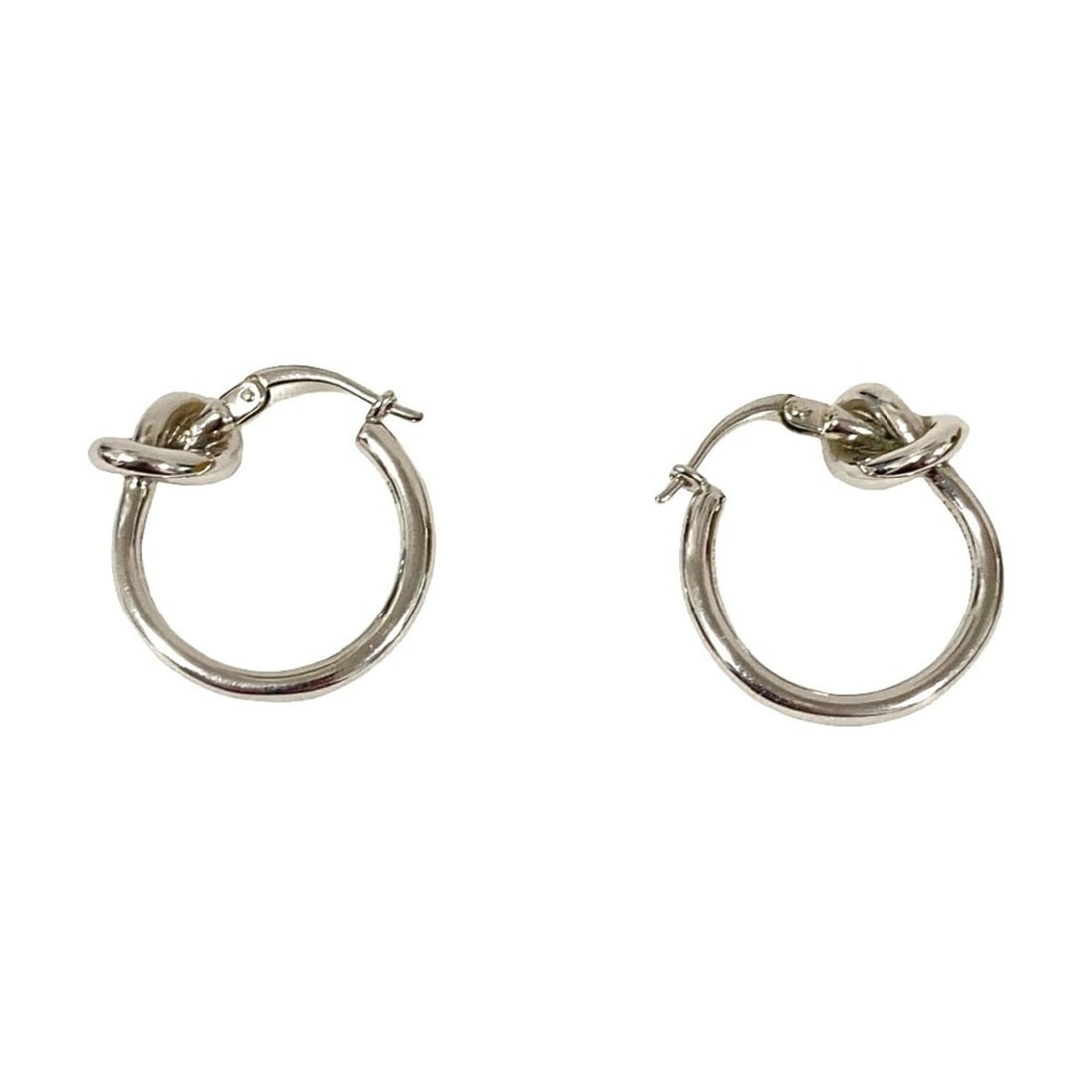 CELINE Knot Earrings, Silver Color, Men's & Women's: --- Catalog ---Category: SizeSize (HxWxD): 22.00mm x 20.00mm / 0.87'' x 0.79''Category: DesignType: Stud earringsColor: SilverGender: Men,WomenCategory: GeneralBrand: Celine--- Item List ---Section: C