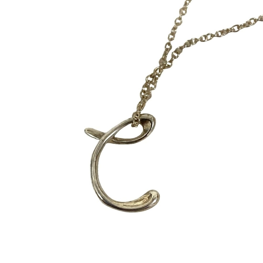 Tiffany & Co. Elsa Peretti Letter C Initial Necklace, 925 Sterling Silver, Women's: --- Catalog ---Category: SizePendant Size: 15mm x 10mm / 0.59'' x 0.39''Neck Circumference: 40.5 cm / 15.94''Category: DesignColor: SilverGender: WomenMaterial: Silver 925Necklace Type: NecklaceCatego