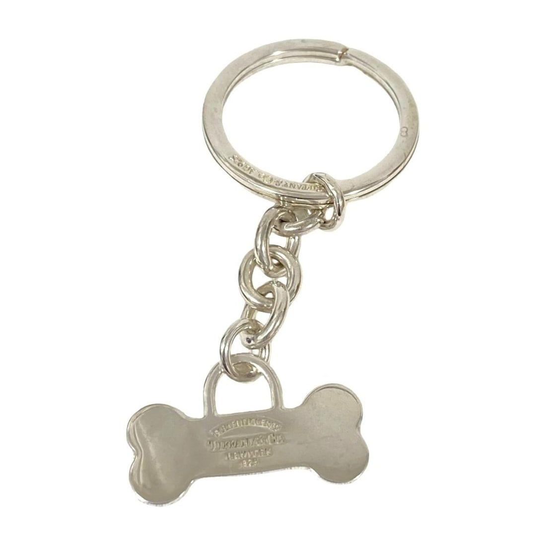 Tiffany & Co. Return to Bone Keyring, 925 Silver, Men's Women's: --- Catalog ---Category: SizeSize (HxWxD): 7cm x 3cm / 2.75'' x 1.18''Category: DesignType: KeyringColor: SilverGender: Men,WomenMaterial: Silver 925Category: GeneralBrand: Tiffany--- Item List ---Sec