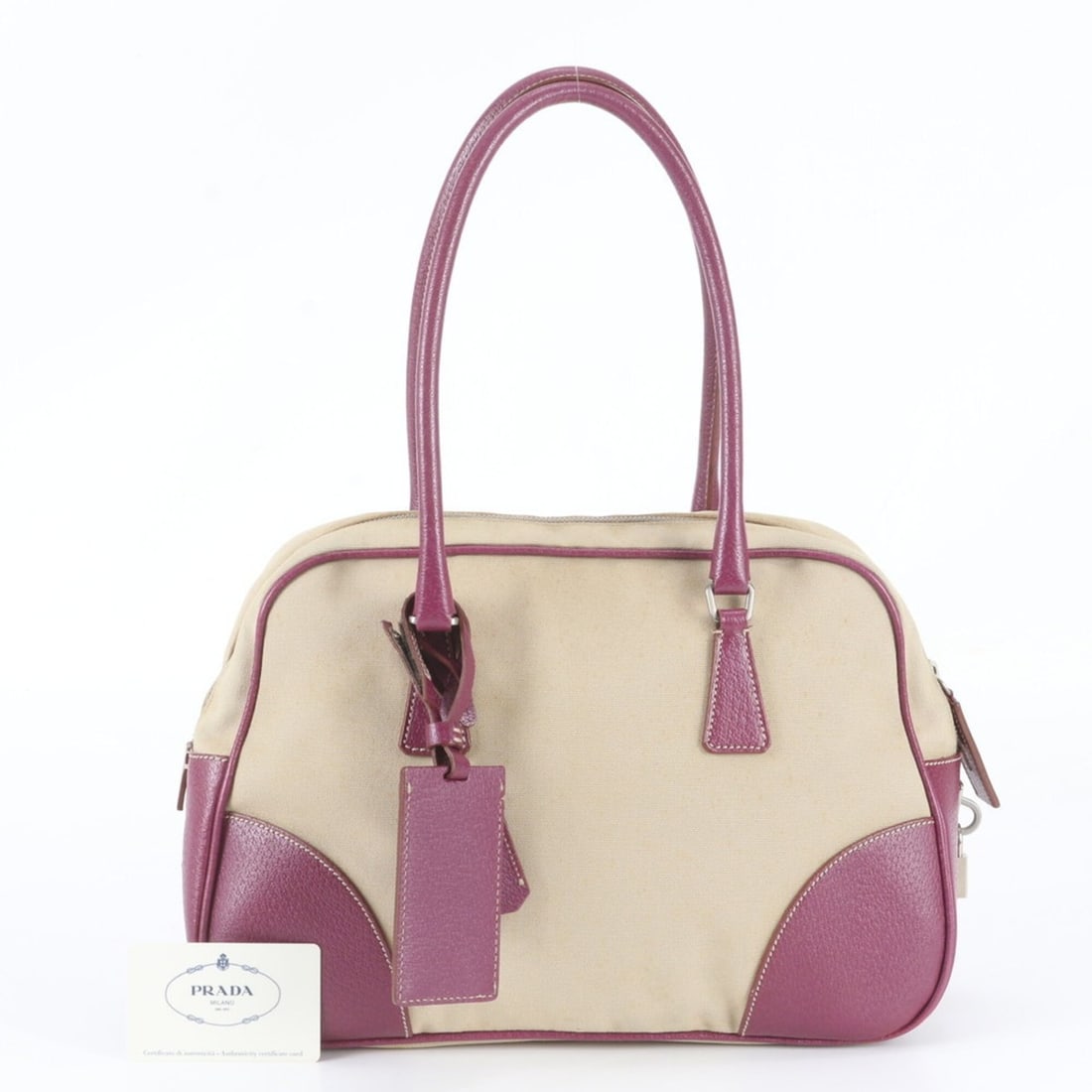 Prada Triangle Logo Leather Shoulder Bag/Handbag for Women, with Guarantee Card (BL0053): --- Catalog ---Category: SizeSize (HxWxD): 22cm x 34cm x 12cm / 8.66'' x 13.38'' x 4.72''Category: DesignType: Handbag, Shoulder bagColor: Ivory, PurpleGender: WomenMaterial: Leather , Canvas Category