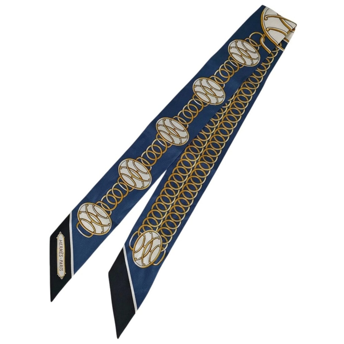 HERMES 100% Silk Lift Profile Twilly Scarf, Navy, Women's: --- Catalog ---Category: SizeSize (LxW): 86cm x 5cm / 33.85'' x 1.96''Category: DesignType: ScarfColor: NavyGender: WomenMaterial: Silk 100%Category: GeneralBrand: Hermes--- Item List ---Section: Cond