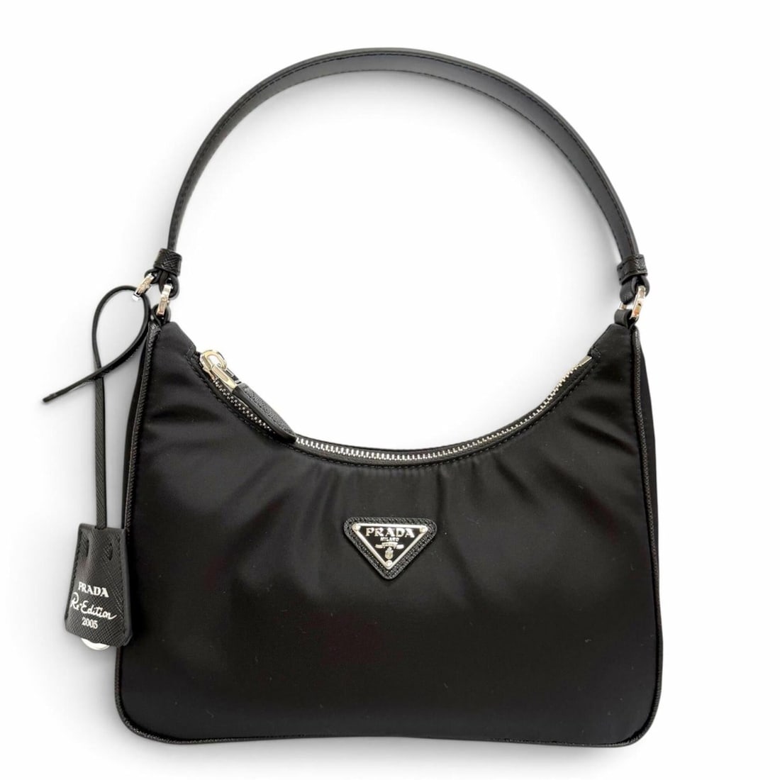 PRADA 1N204X Re-Edition 2005 Re-Nylon Triangle Logo Handbag with Keyring, Black, Silver Hardware,: --- Catalog ---Category: SizeSize (HxWxD): 22cm x 18cm x 6.5cm / 8.66'' x 7.08'' x 2.55''Category: DesignType: HandbagColor: BlackGender: WomenMaterial: Nylon Hardware Color: SilverCategory: GeneralMP