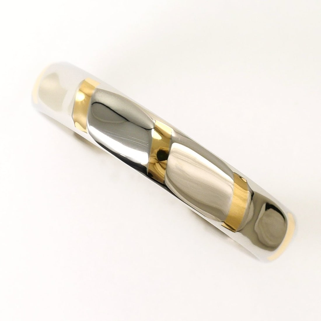 Celine PT850 Platinum 18K Yellow Gold Ring, Size 1, Total Weight 3.0g, Like New.: --- Catalog ---Category: SizeWidth: 3mm / 0.12''Weight: 3g / 0.1oz.JP Size: 11US Size: 6Category: DesignType: Band ringGender: WomenMaterial: Platinum 850, Yellow gold (18K)Category: GeneralBrand: Cel