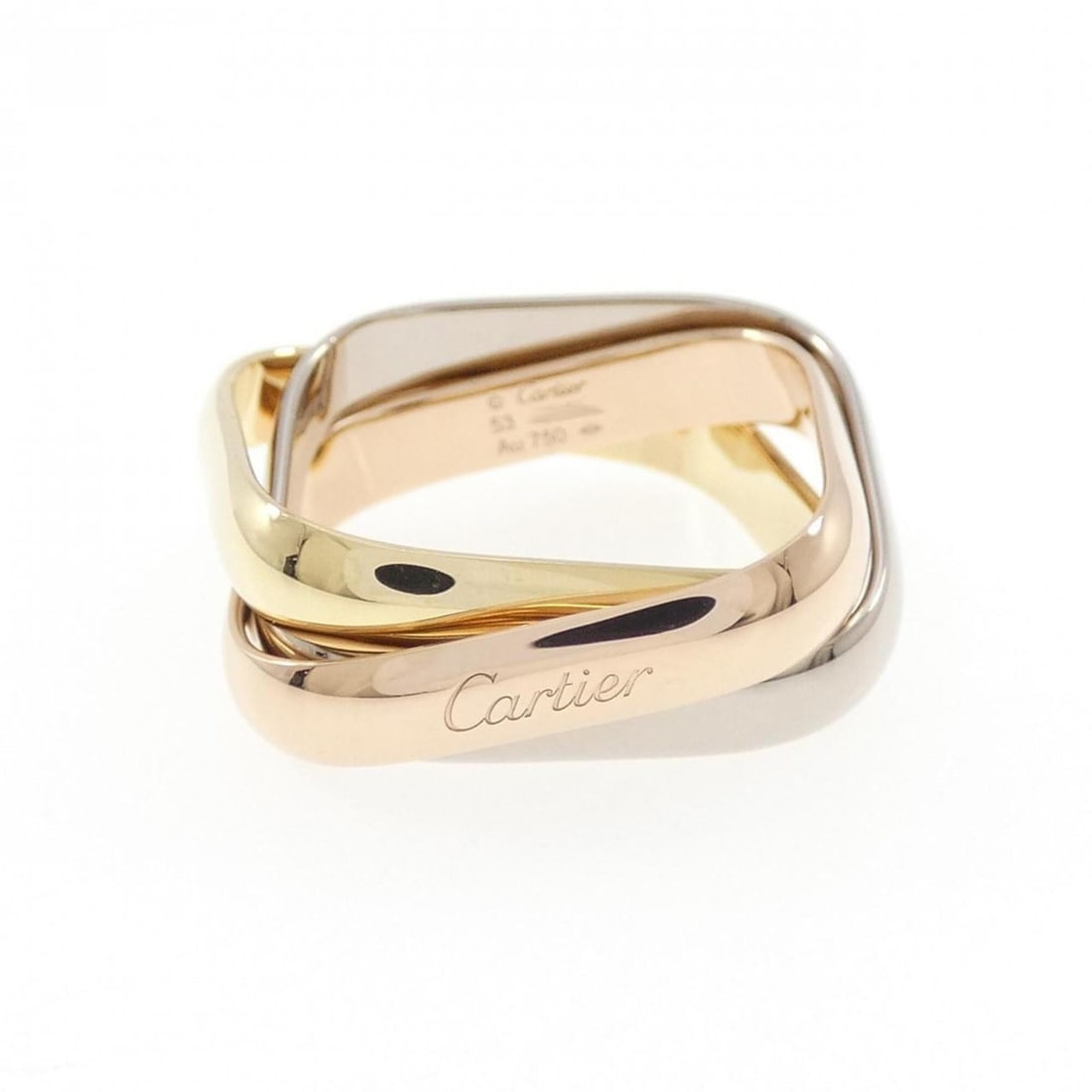 Cartier Trinity MM Ring: --- Catalog ---Category: SizeUS Size: 6.5Brand Size: 53Category: DesignType: Band ringGender: WomenMaterial: Pink gold (18K), White gold (18K), Yellow gold (18K)Category: GeneralMPN: B4240600Brand: