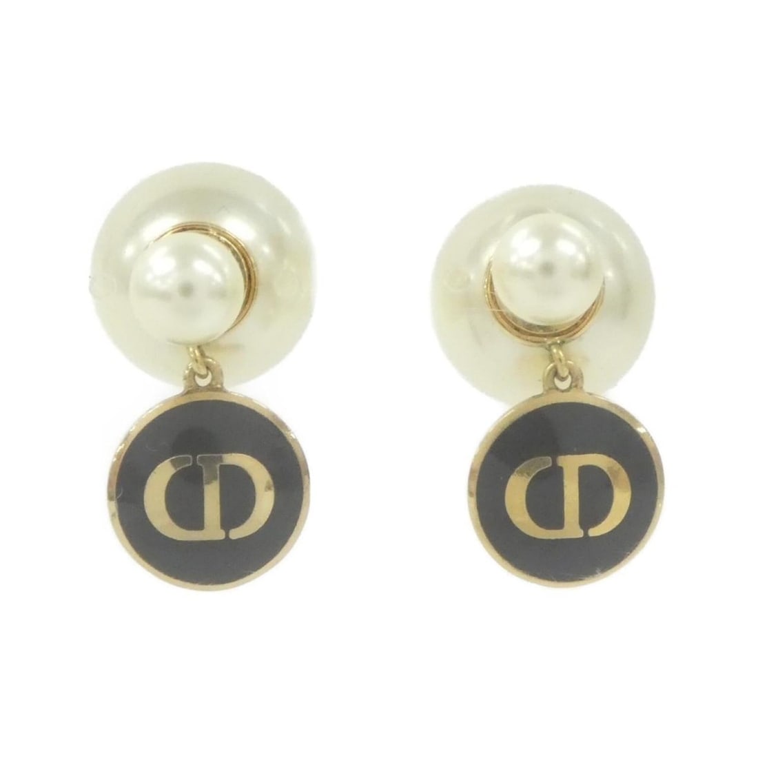 Christian Dior Tribal Earrings: --- Catalog ---Category: SizeSize (HxWxD): 25.00mm x 14.00mm / 0.98'' x 0.55''Category: DesignType: Stud earringsColor: Black, WhiteGender: WomenCategory: GeneralBrand: Christian Dior--- Item List