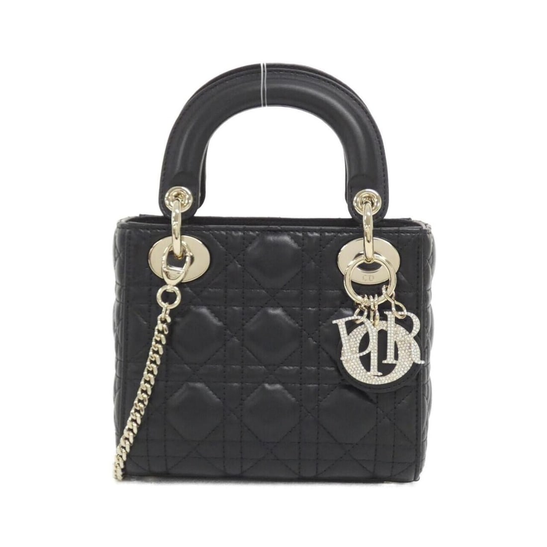 Christian Dior Lady Mini M0505ONUL Handbag: --- Catalog ---Category: SizeSize (HxWxD): 15cm x 17cm x 7cm / 5.9'' x 6.69'' x 2.75''Category: DesignType: HandbagColor: BlackGender: WomenMaterial: Leather Hardware Color: GoldLeather/Fur Type: