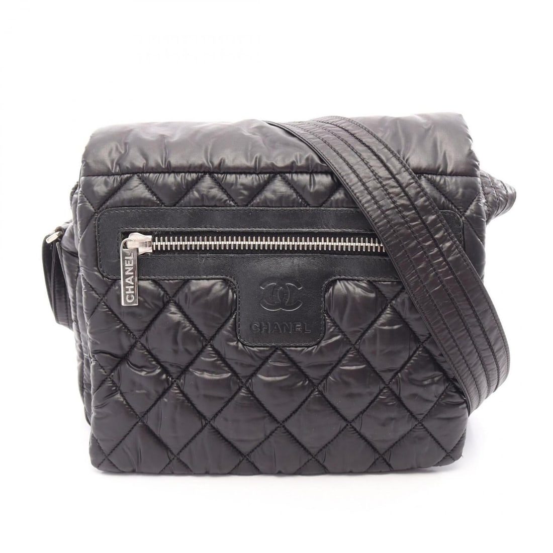 Chanel Coco Cocoon Small Messenger Shoulder Bag Handbag Nylon Leather Women's Black: --- Catalog ---Category: SizeSize (HxWxD): 21cm x 24cm x 10cm / 8.26'' x 9.44'' x 3.93''Category: DesignType: Handbag, Shoulder bagColor: BlackGender: WomenMaterial: Nylon , Leather Hardware Color: Si