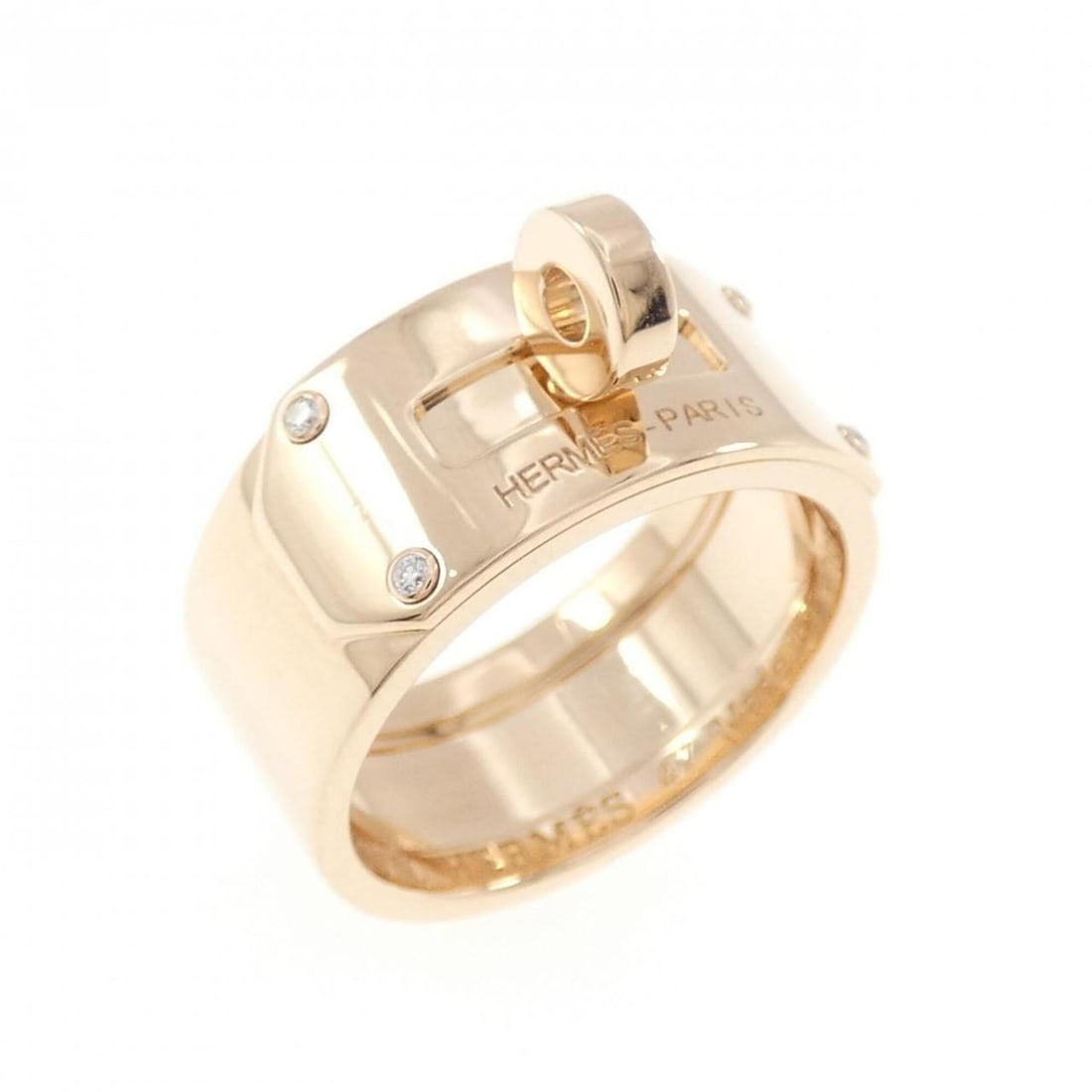 Hermes diamond ring: --- Catalog ---Category: SizeWidth: 7.8mm / 0.31''Weight: 7.2g / 0.25oz.JP Size: 7US Size: 4Category: DesignType: Band ringStone: DiamondGender: WomenMaterial: Pink gold (18K)Category: GeneralBrand: