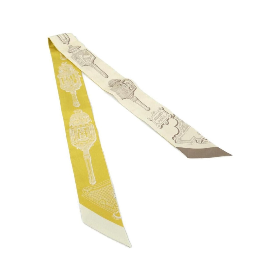 Hermes Twilly 063081S Scarf Muffler: --- Catalog ---Category: SizeSize (LxW): 86cm x 5cm / 33.85'' x 1.96''Category: DesignType: ScarfColor: BeigeGender: Men,WomenMaterial: Silk Category: GeneralLine: TwillyBrand: Hermes--- Item List ---