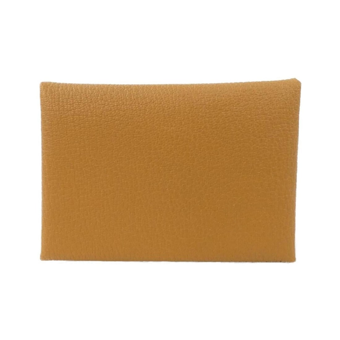 Hermes Calvi Duo 082977CK Wallet/Coin Case: --- Catalog ---Category: SizeSize (HxWxD): 7cm x 10.5cm x 2cm / 2.75'' x 4.13'' x 0.78''Category: DesignType: Coin purse/coin caseColor: CaramelGender: Women,MenMaterial: Chevre leather Category: