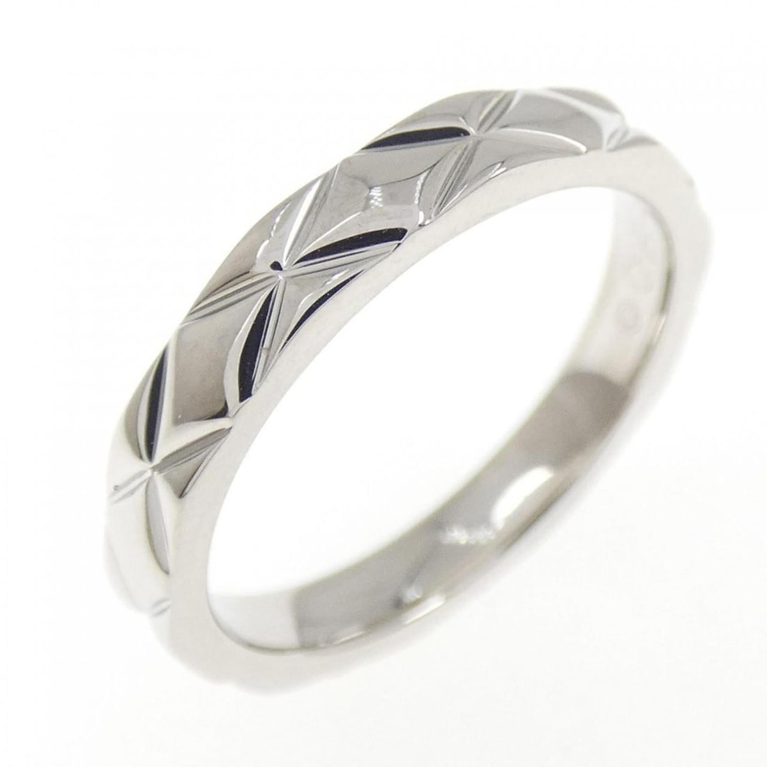 Chanel Matelassé Ring: --- Catalog ---Category: SizeUS Size: 5Brand Size: 49Category: DesignType: Band ringColor: PlatinumGender: WomenMaterial: Platinum 950Category: GeneralBrand: Chanel--- Item List ---Section: ConditionR