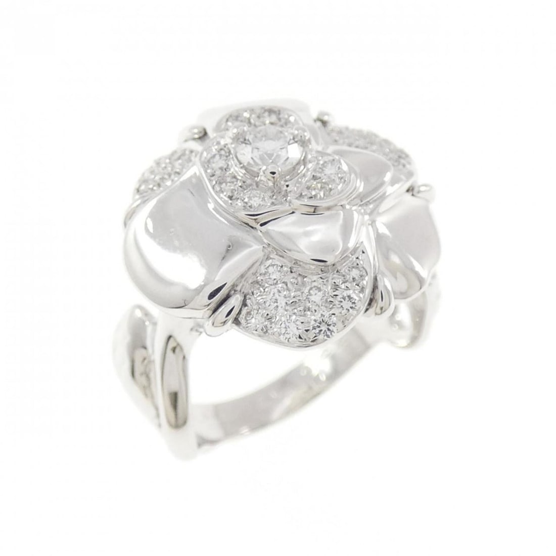 Chanel Camellia Ring: --- Catalog ---Category: SizeJP Size: 6US Size: 3.5Category: DesignType: Band ringColor: White goldStone: DiamondGender: WomenMaterial: White gold (18K)Category: GeneralMPN: J1615Brand: Chanel---