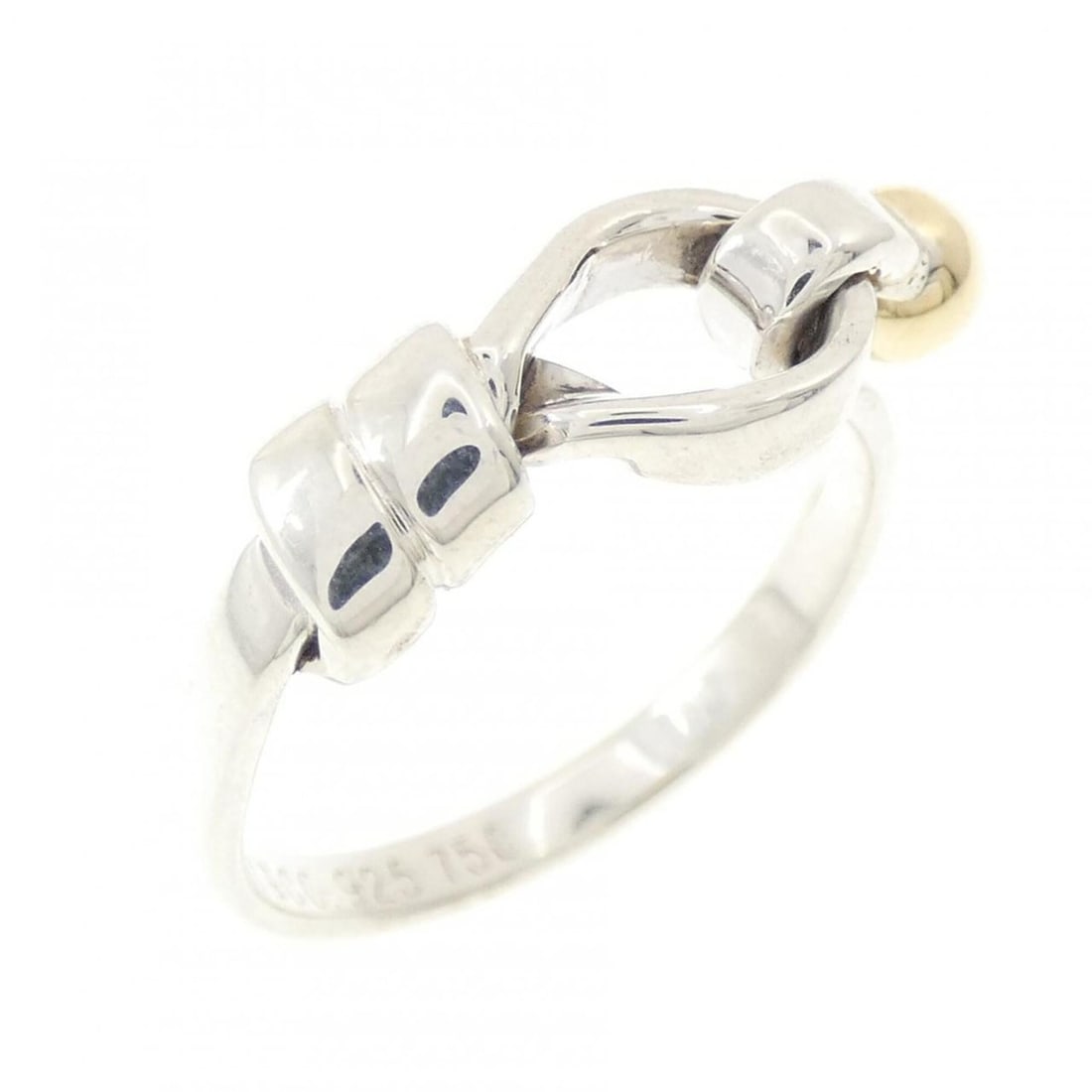Tiffany & Co. Flat Wire Love Knot Ring: --- Catalog ---Category: SizeJP Size: 12US Size: 6.5Category: DesignType: Band ringGender: WomenMaterial: Silver 925, Yellow gold (18K)Category: GeneralBrand: Tiffany--- Item List ---Section: