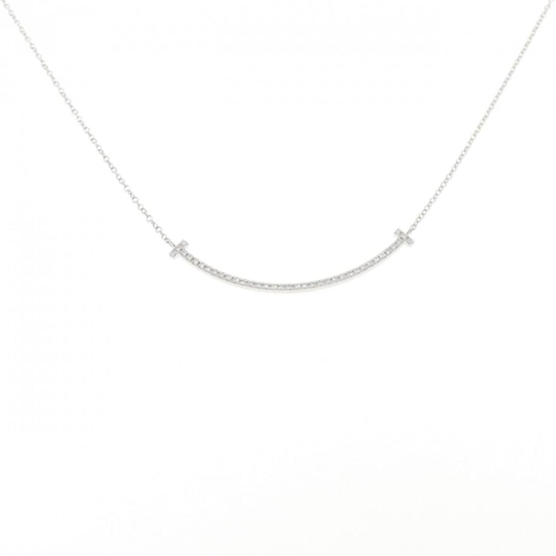 Tiffany T Smile Small Necklace: --- Catalog ---Category: SizePendant Size: 3.3mm x 37mm / 0.12'' x 1.45''Neck Circumference: 41 cm / 16.14''Category: DesignGender: WomenMaterial: White gold (18K)Pendant Type: PendantNecklace Type: N