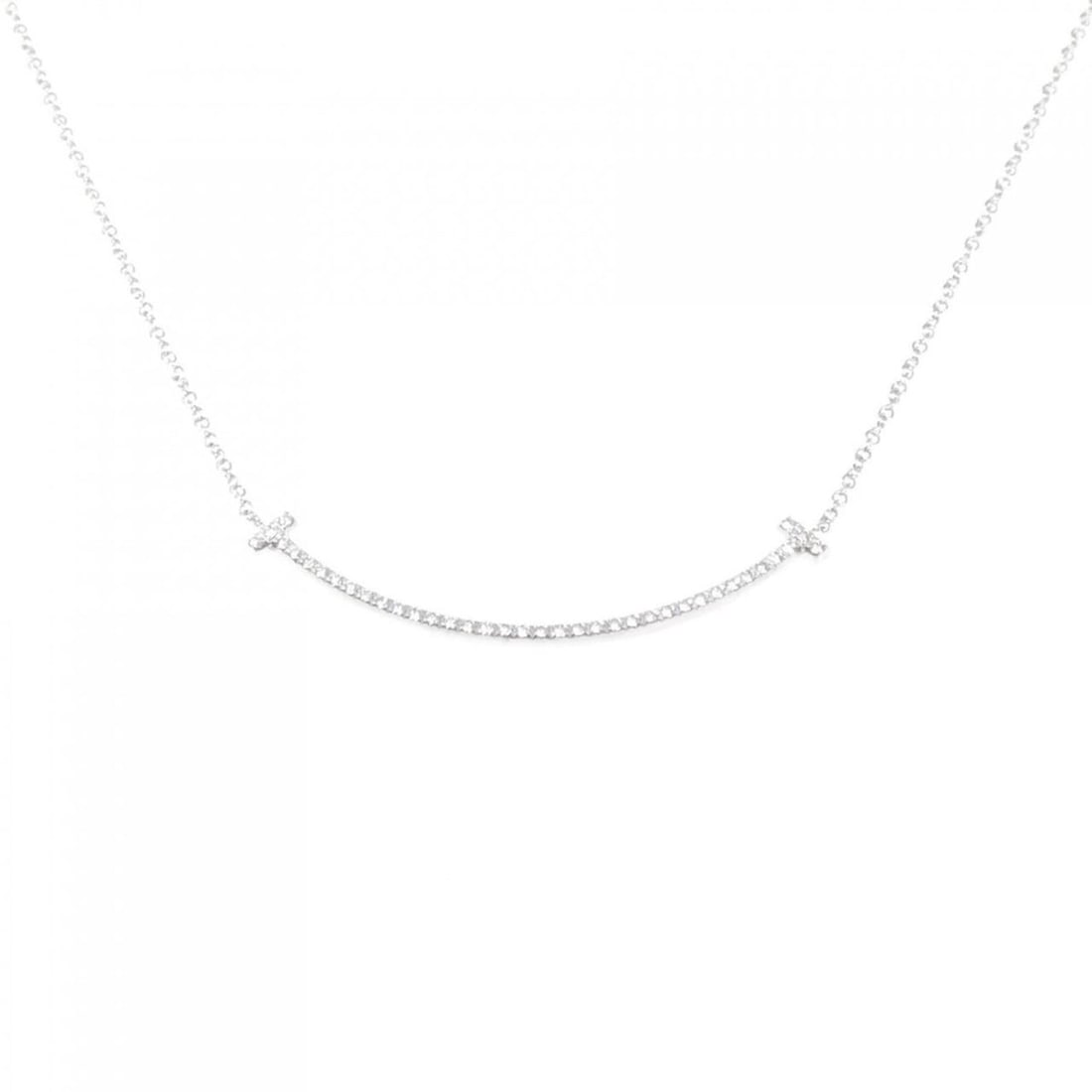 Tiffany T Smile Small Necklace: --- Catalog ---Category: SizePendant Size: 3.6mm x 36.7mm / 0.14'' x 1.44''Neck Circumference: 40 cm / 15.74''Category: DesignGender: WomenMaterial: White gold (18K)Pendant Type: PendantNecklace Type: