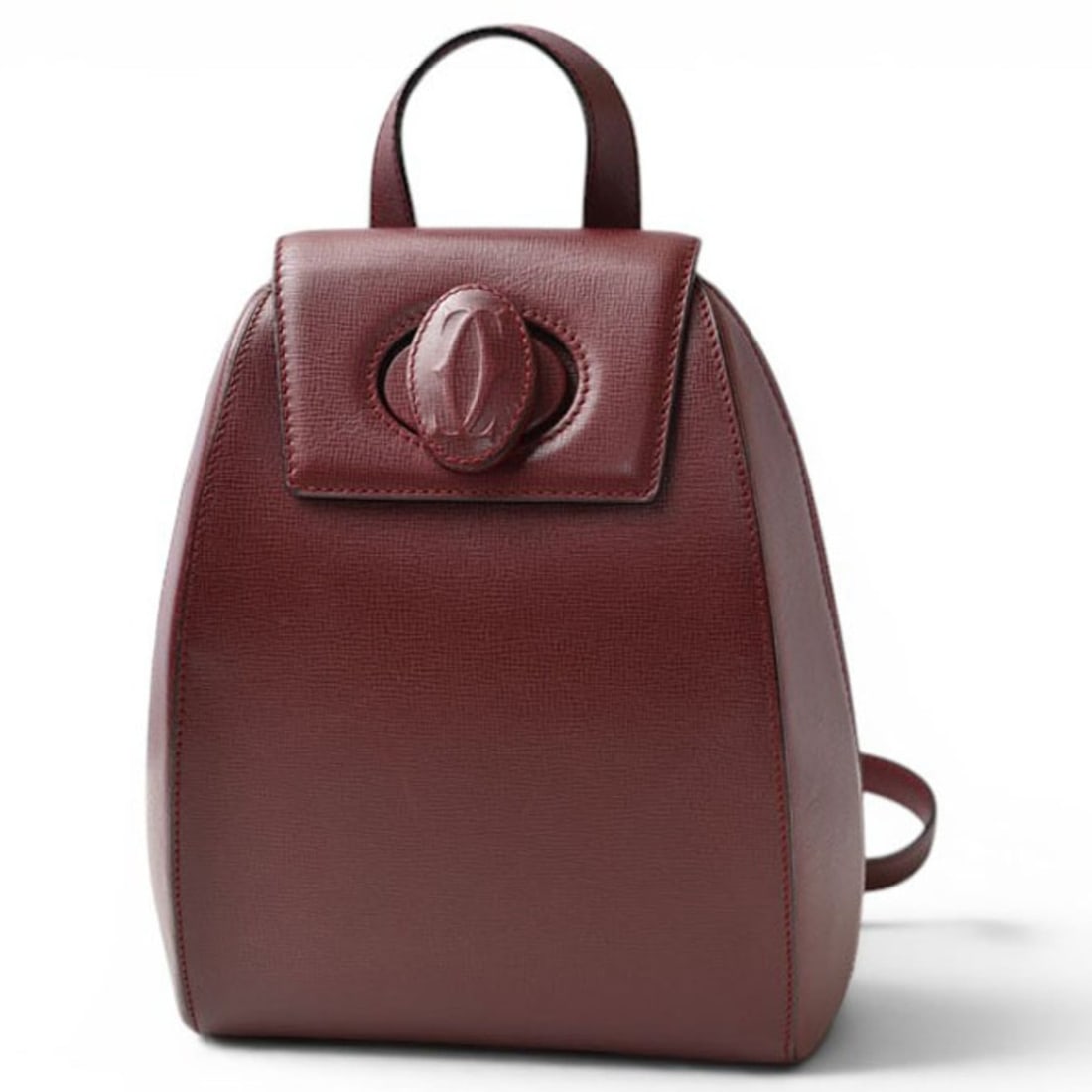 Cartier backpack, Must de bag, leather, burgundy.: --- Catalog ---Category: SizeSize (HxWxD): 25.5cm x 23cm x 11cm / 10.03'' x 9.05'' x 4.33''Category: DesignType: BackpackColor: BordeauxGender: Women,MenMaterial: Leather Category: GeneralBrand: Carti