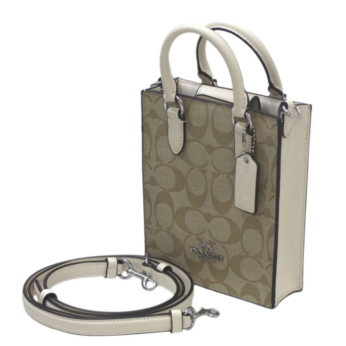 COACH North-South Mini Tote Handbag/Shoulder Bag, Signature Canvas, Beige, CJ494: --- Catalog ---Category: SizeSize (HxWxD): 17cm x 14cm x 5cm / 6.69'' x 5.51'' x 1.96''Category: DesignType: Handbag, Shoulder bag, Tote bagColor: BeigeGender: WomenCategory: GeneralBrand: CoachCountr