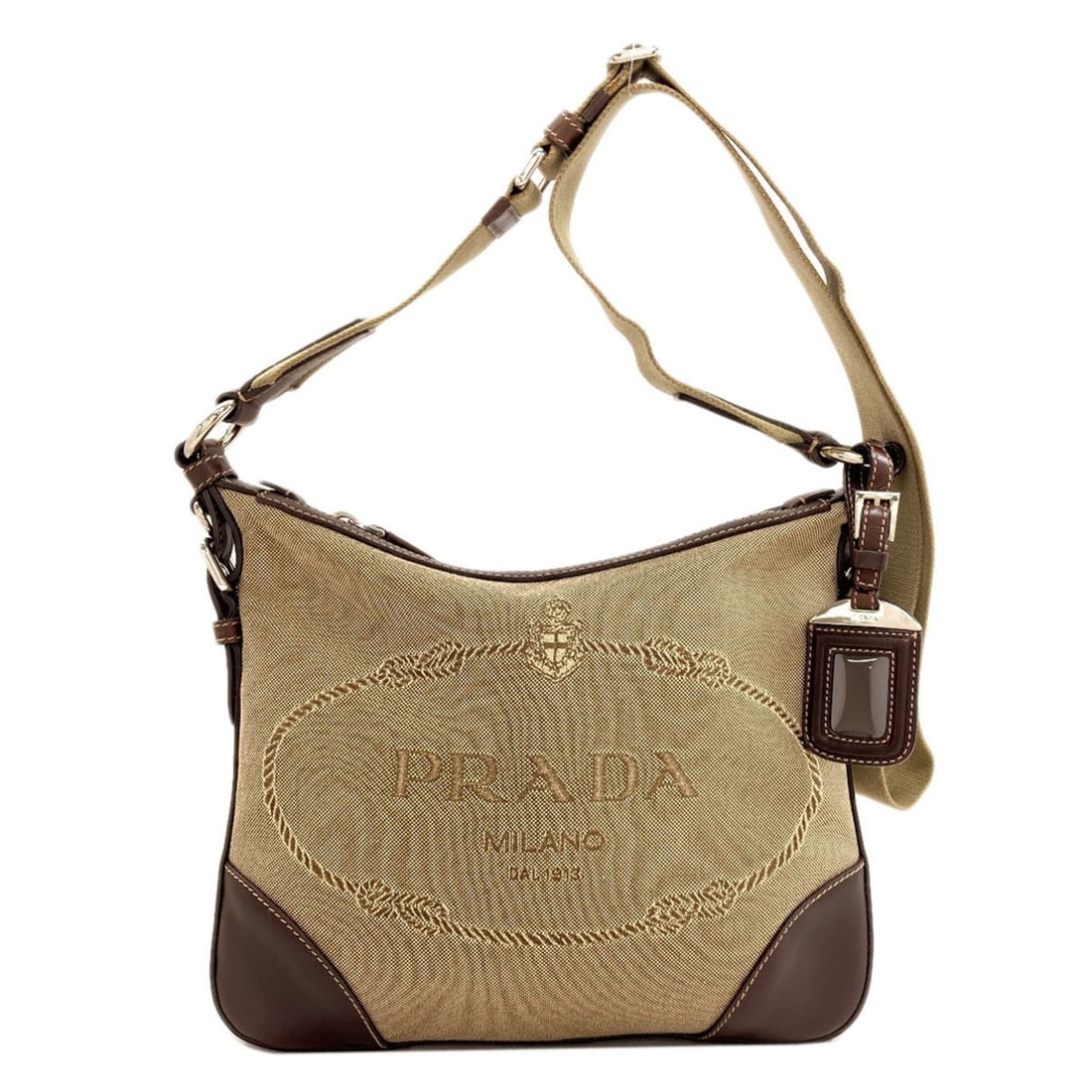 Prada BT0534 Long Shoulder Logo Jacquard Bag Canvas/Leather Women's PRADA: --- Catalog ---Category: SizeSize (HxWxD): 23.5cm x 28cm x 2cm / 9.25'' x 11.02'' x 0.78''Category: DesignType: Shoulder bagColor: BrownGender: WomenMaterial: Canvas , Leather Category: GeneralBrand: 
