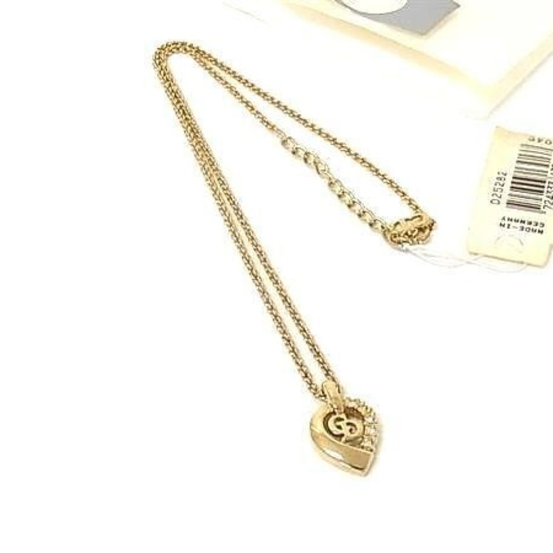 Christian Dior Necklace, Heart Design, Gold Metal, Rhinestones, Women's: --- Catalog ---Category: SizePendant Size: 20mm x 14mm / 0.78'' x 0.55''Neck Circumference: 45 cm / 17.71''Category: DesignStone: RhinestoneGender: WomenMaterial: MetalPendant Type: PendantNecklace Ty