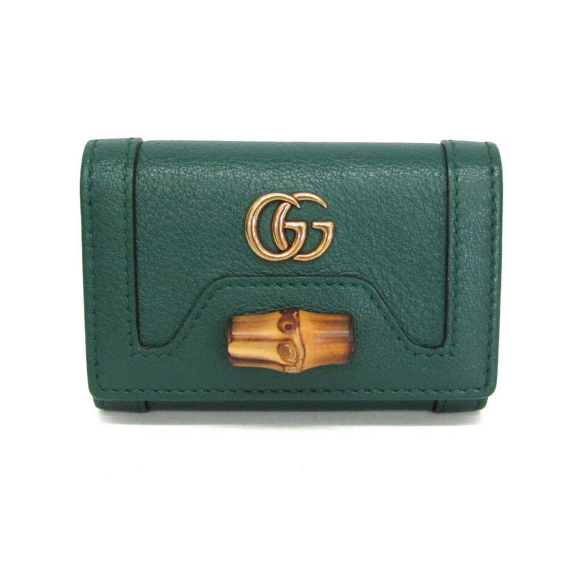 Gucci Bamboo Diana 658636 Women's Leather Key Case Green: --- Catalog ---Category: DesignType: KeycaseColor: GreenGender: WomenClosure: Snap fastenerMaterial: Leather Inner Pocket: Open pocket 1Number of Key Hooks: 6Category: GeneralLine: BambooBrand: GucciM