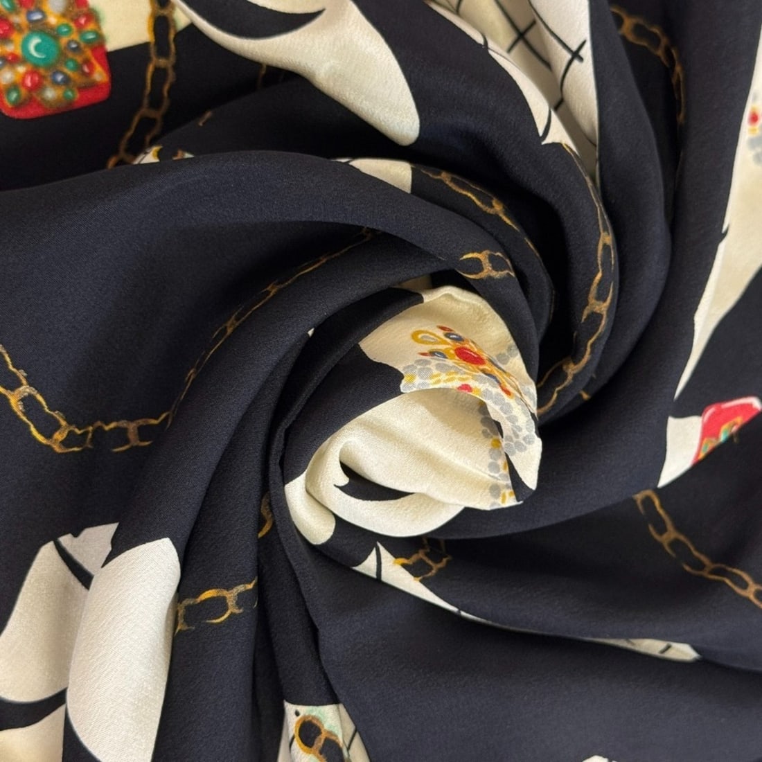 CHANEL Mademoiselle Matelassé Scarf/Muffler, Black: --- Catalog ---Category: SizeSize (LxW): 86cm x 86cm / 33.85'' x 33.85''Category: DesignType: ScarfColor: BlackGender: WomenMaterial: Silk Category: GeneralBrand: Chanel--- Item List ---Section: