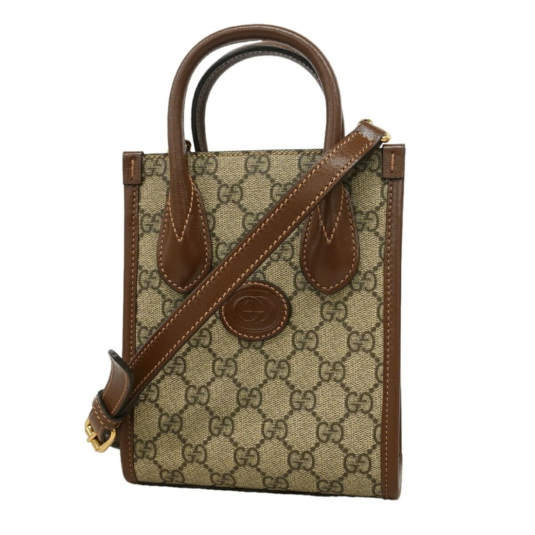 Gucci GG Supreme Interlocking G Handbag 671628 Brown 2-way Bag for Women: --- Catalog ---Category: SizeSize (HxWxD): 19.5cm x 15.5cm x 7cm / 7.67'' x 6.1'' x 2.75''Category: DesignType: HandbagColor: BrownGender: WomenMaterial: PVC Hardware Color: GoldCategory: GeneralMPN: 